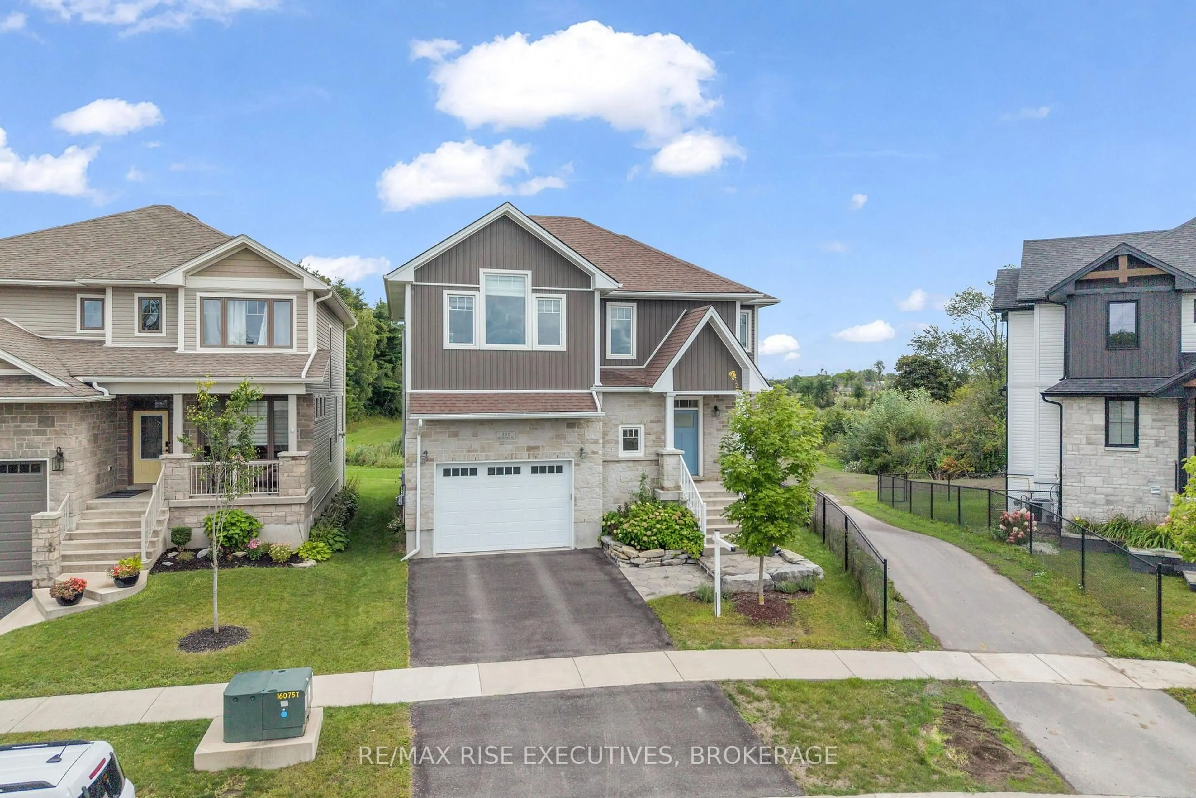 A pic from outside/outdoor area/front of a property/back of a property/a pic from drone, street for 232 Mill Pond Pl, Kingston Ontario K7M 0C9