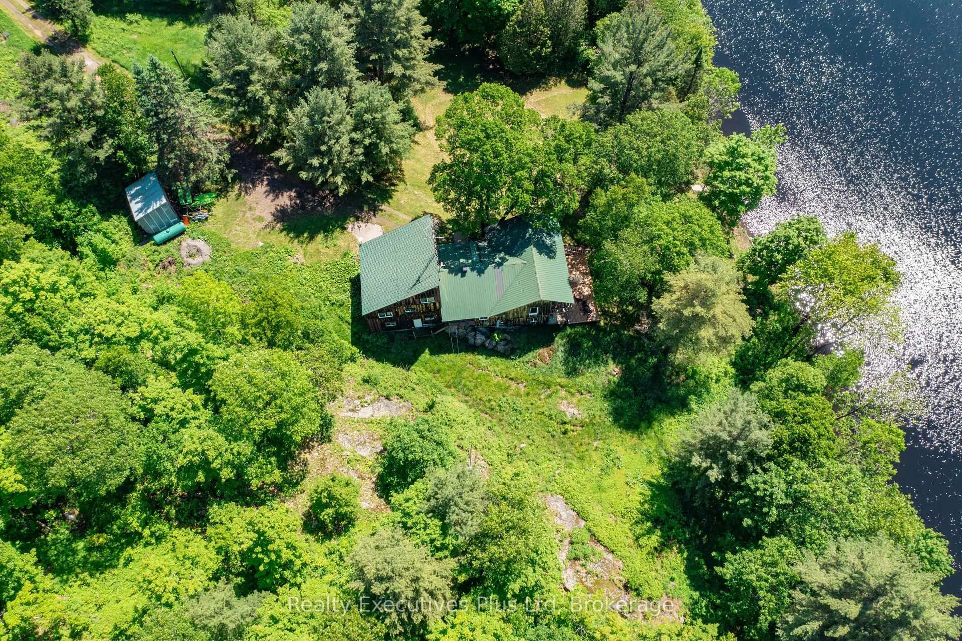 A pic from outside/outdoor area/front of a property/back of a property/a pic from drone, water/lake/river/ocean view for 85 ladds Rd, Whitestone Ontario P0A 1G0