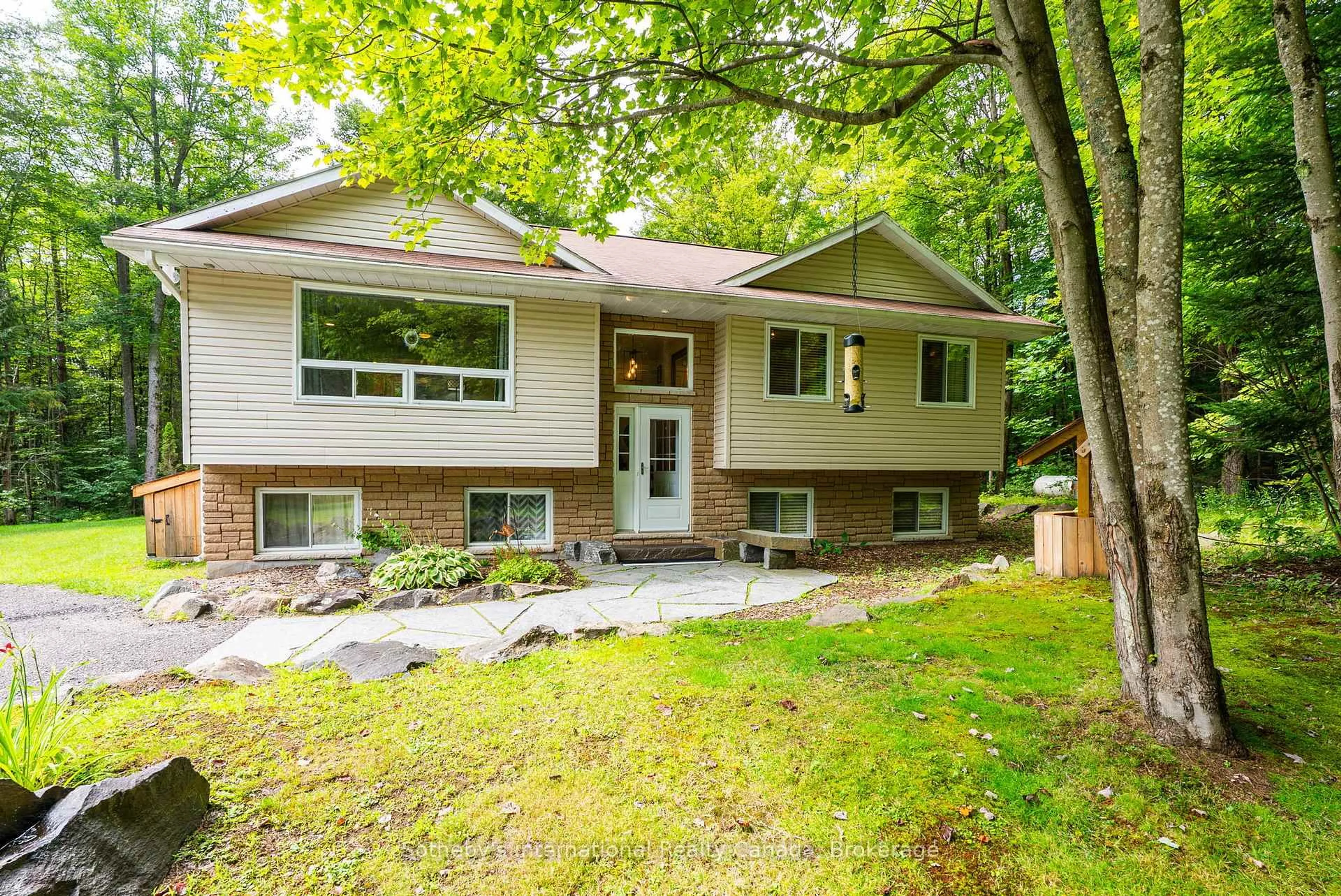Home with vinyl exterior material, street for 1261 Falkenburg Rd, Muskoka Lakes Ontario P1L 1X4