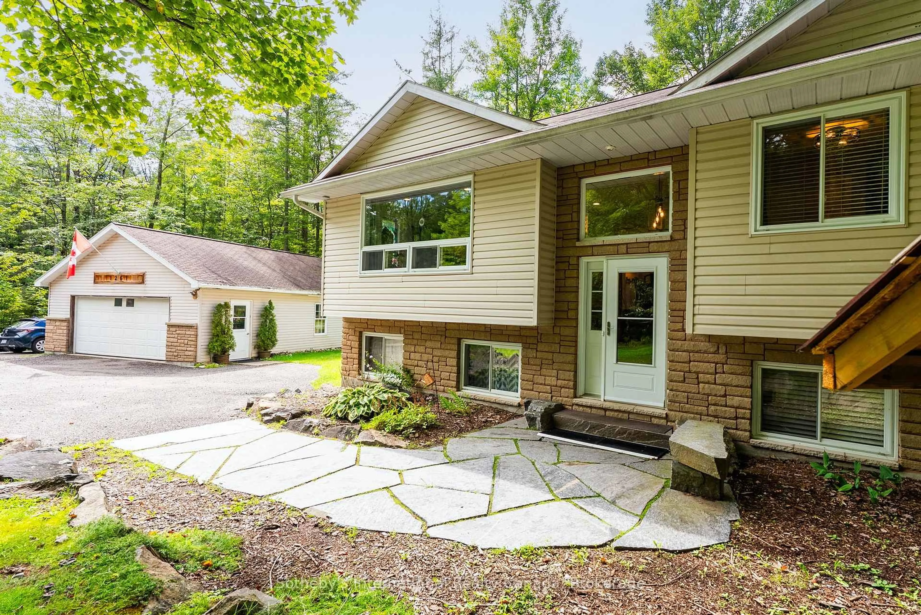 Home with vinyl exterior material, street for 1261 Falkenburg Rd, Muskoka Lakes Ontario P1L 1X4