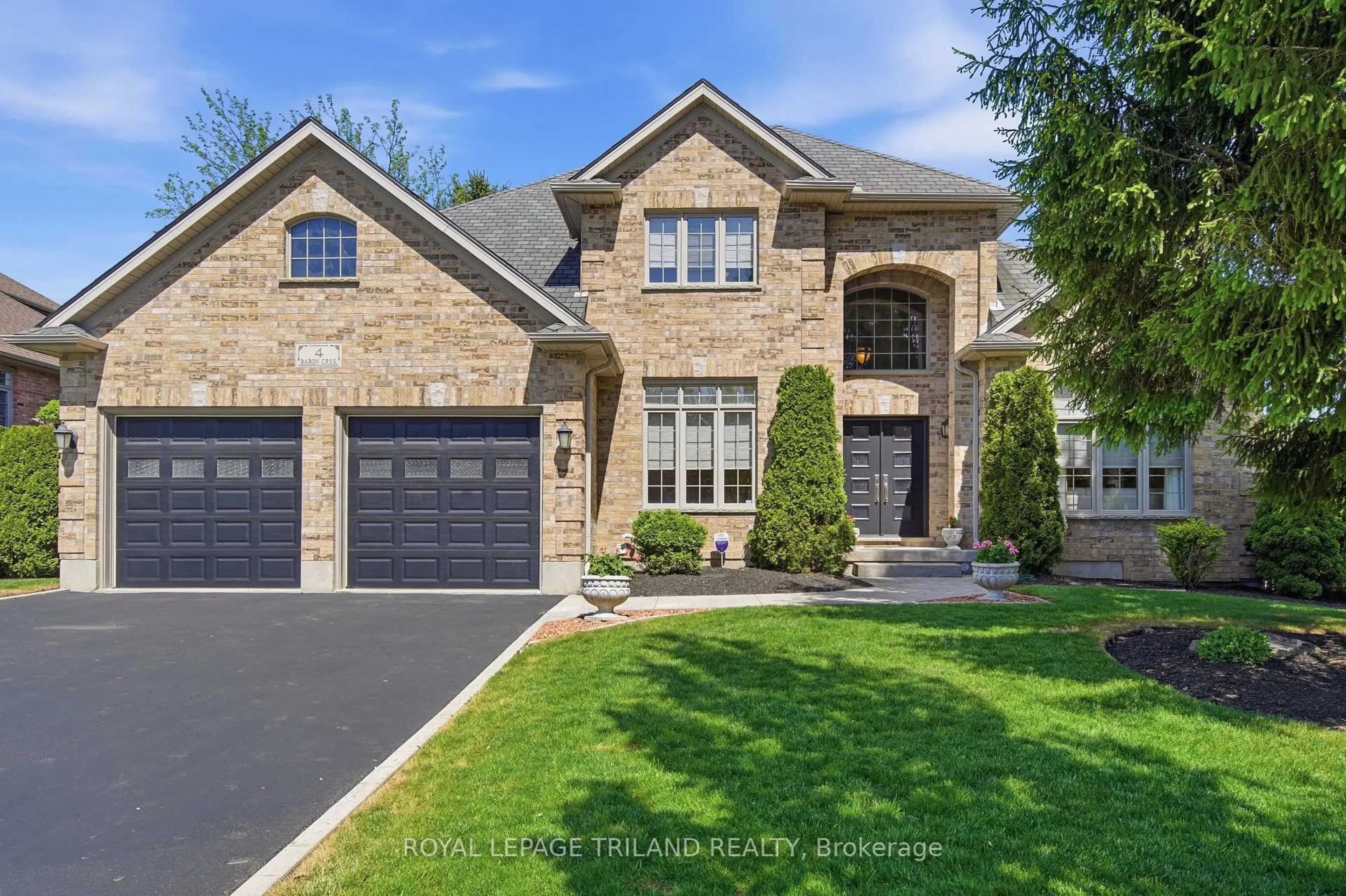 Home with brick exterior material, street for 4 Baron Cres, Middlesex Centre Ontario N0L 1R0