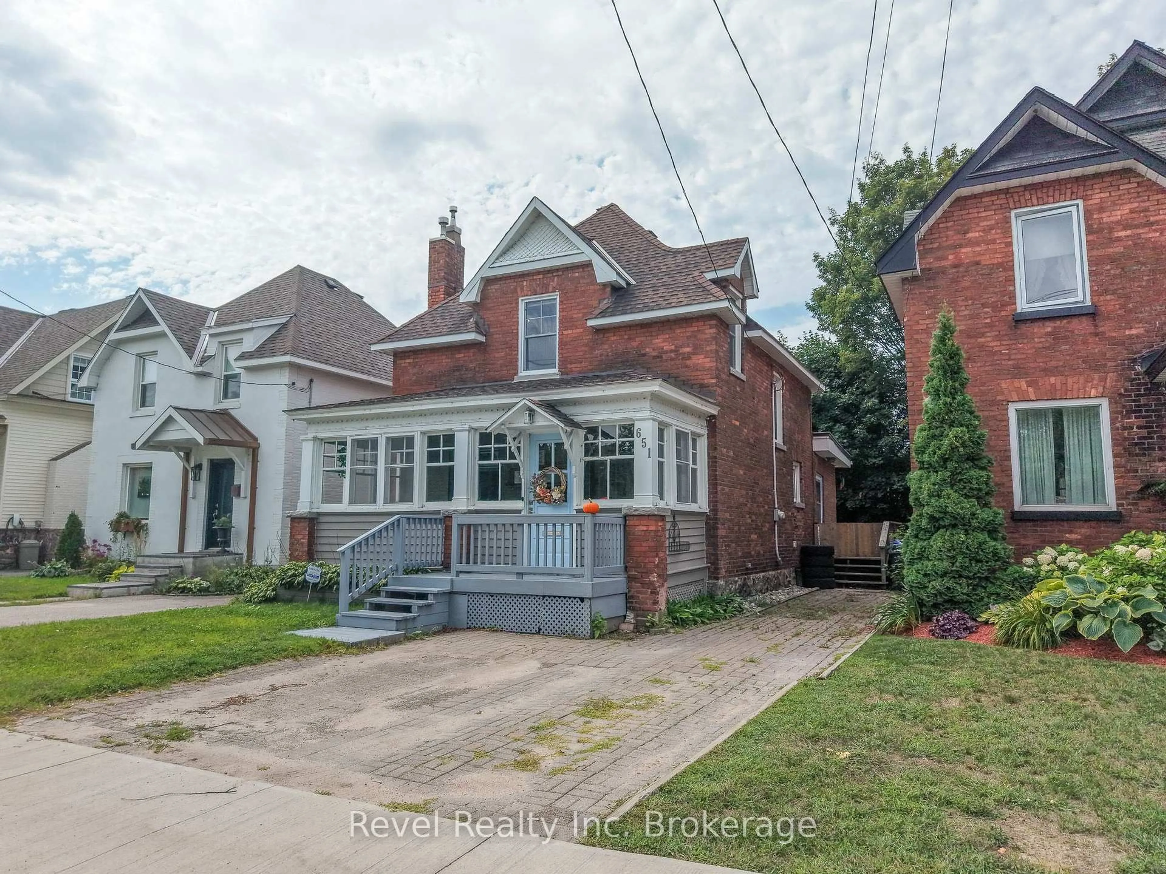 Home with brick exterior material, street for 651 Jane St, North Bay Ontario P1B 3H1