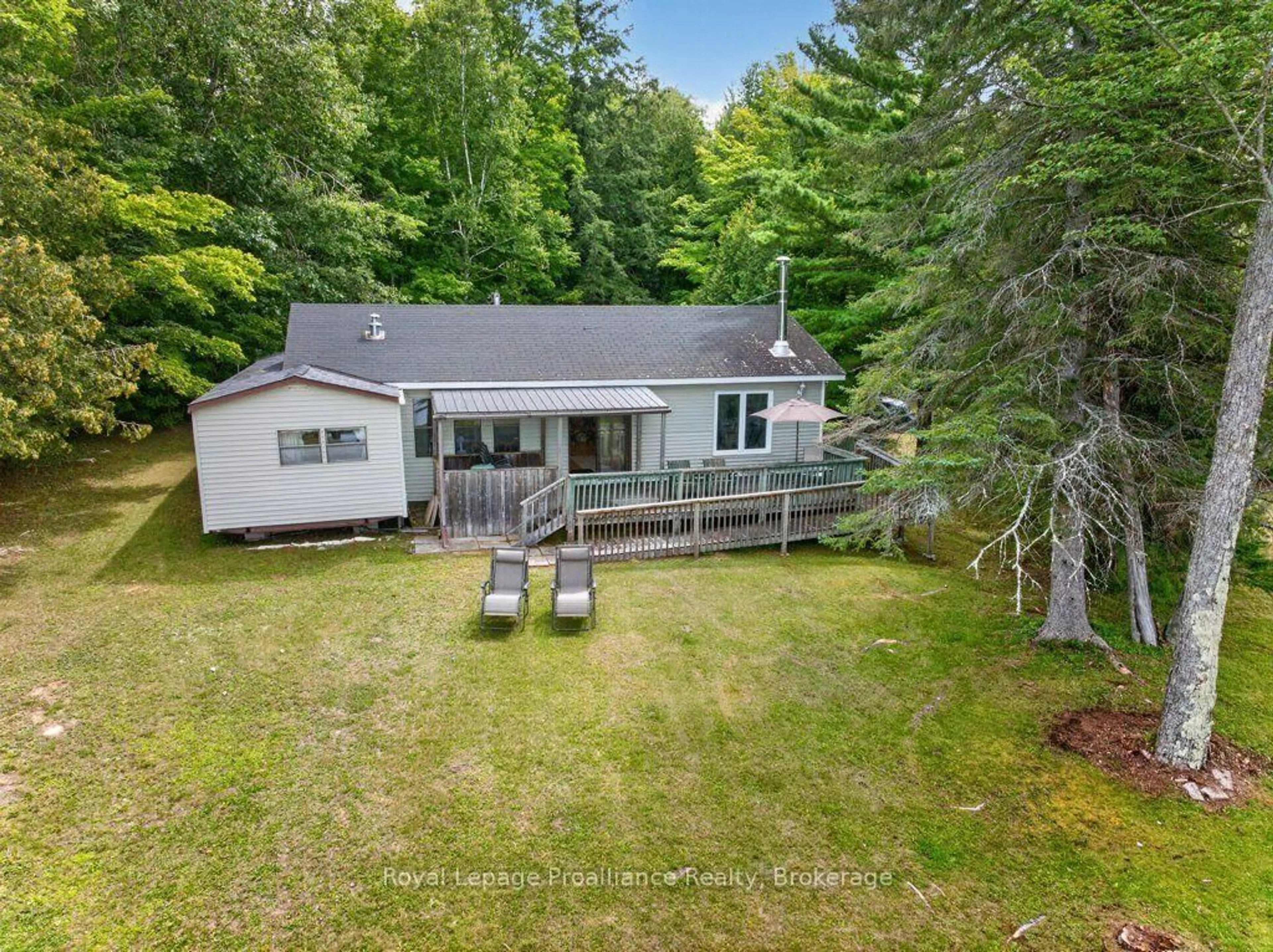A pic from outside/outdoor area/front of a property/back of a property/a pic from drone, unknown for 1693 Gull Lake Rd, Arden Ontario K0H 1B0