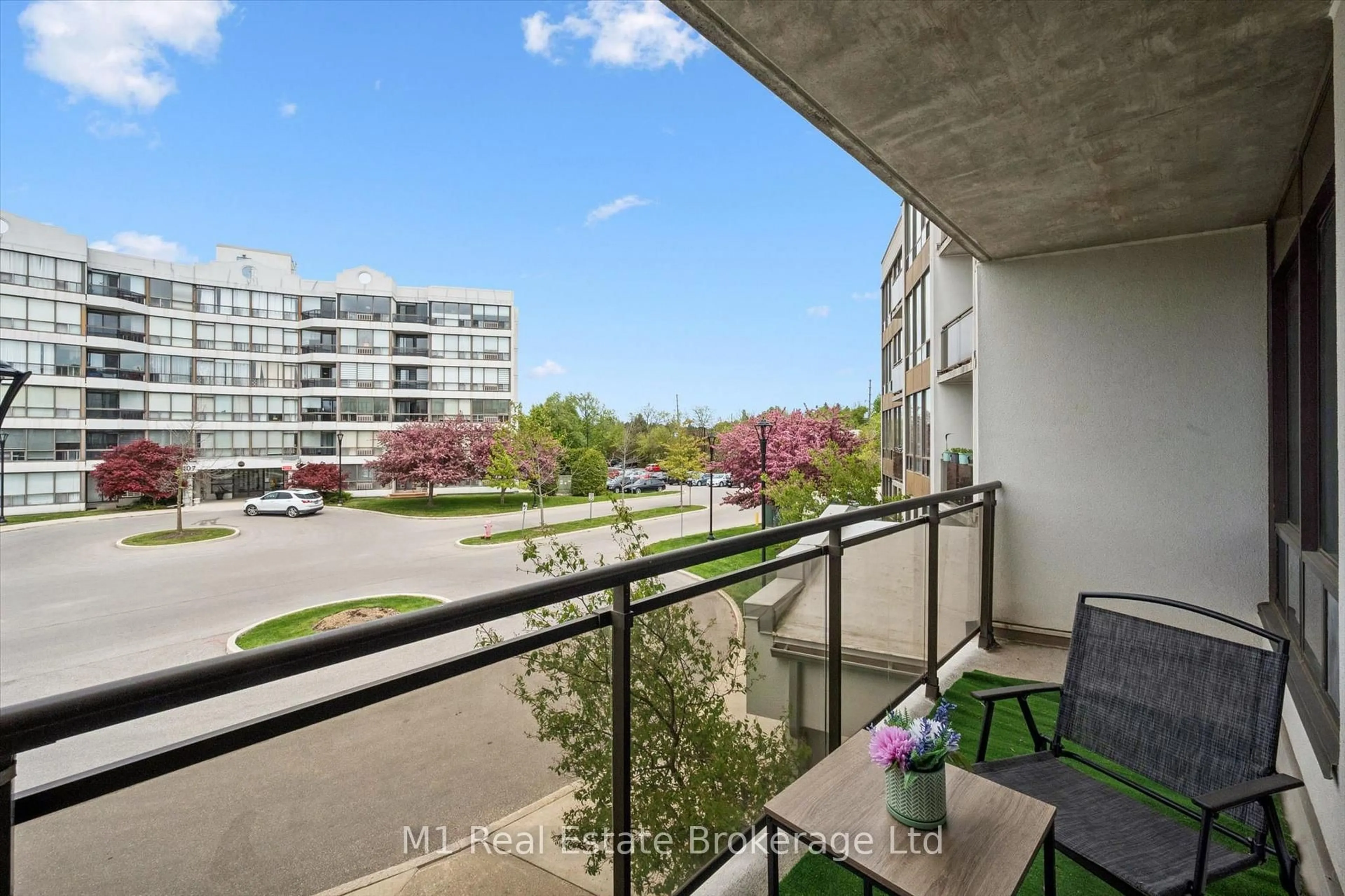 Balcony in the apartment, city buildings view from balcony for 105 Bagot St #208, Guelph Ontario N1H 8H4