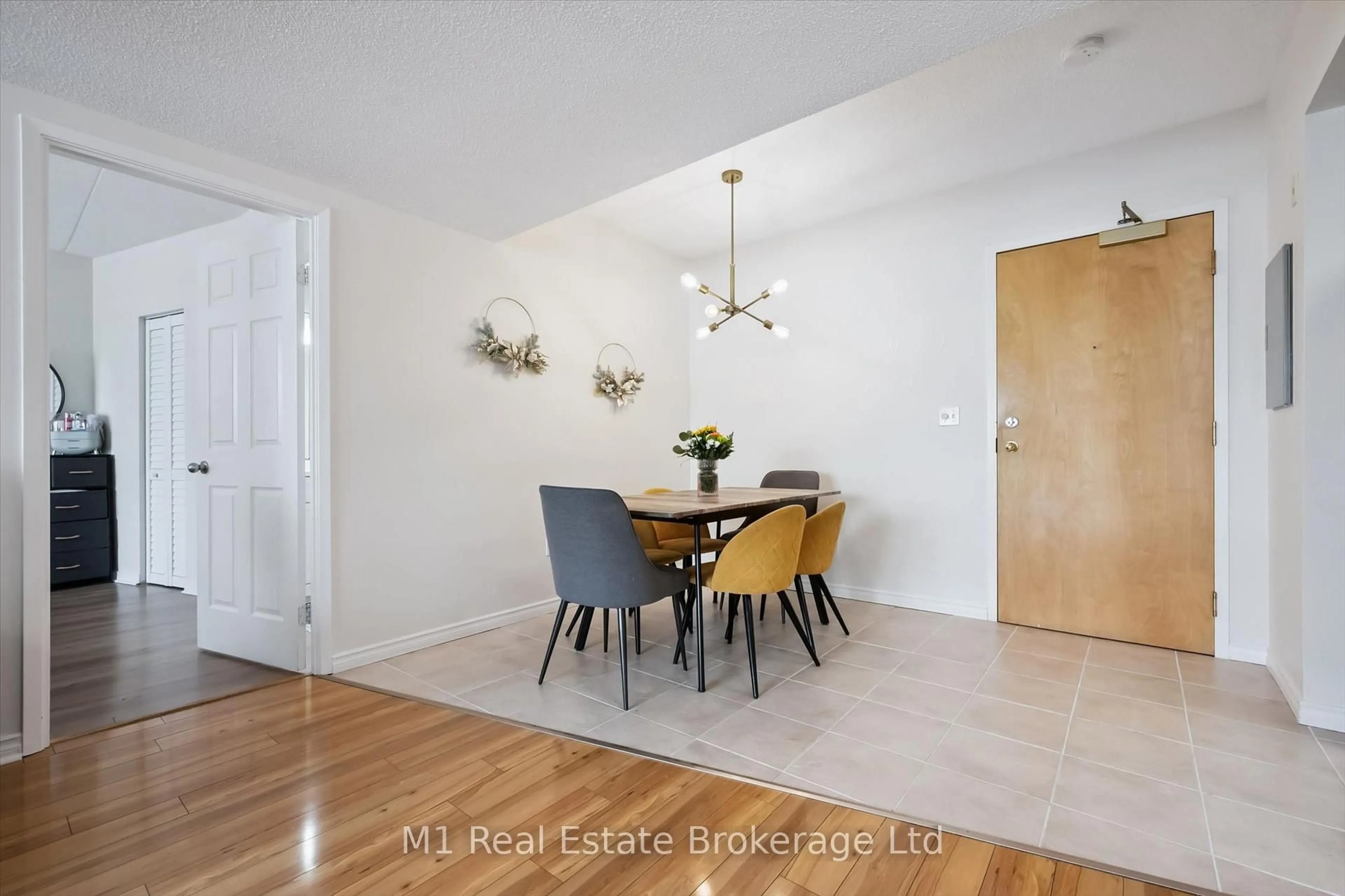 Dining room, wood/laminate floor for 105 Bagot St #208, Guelph Ontario N1H 8H4