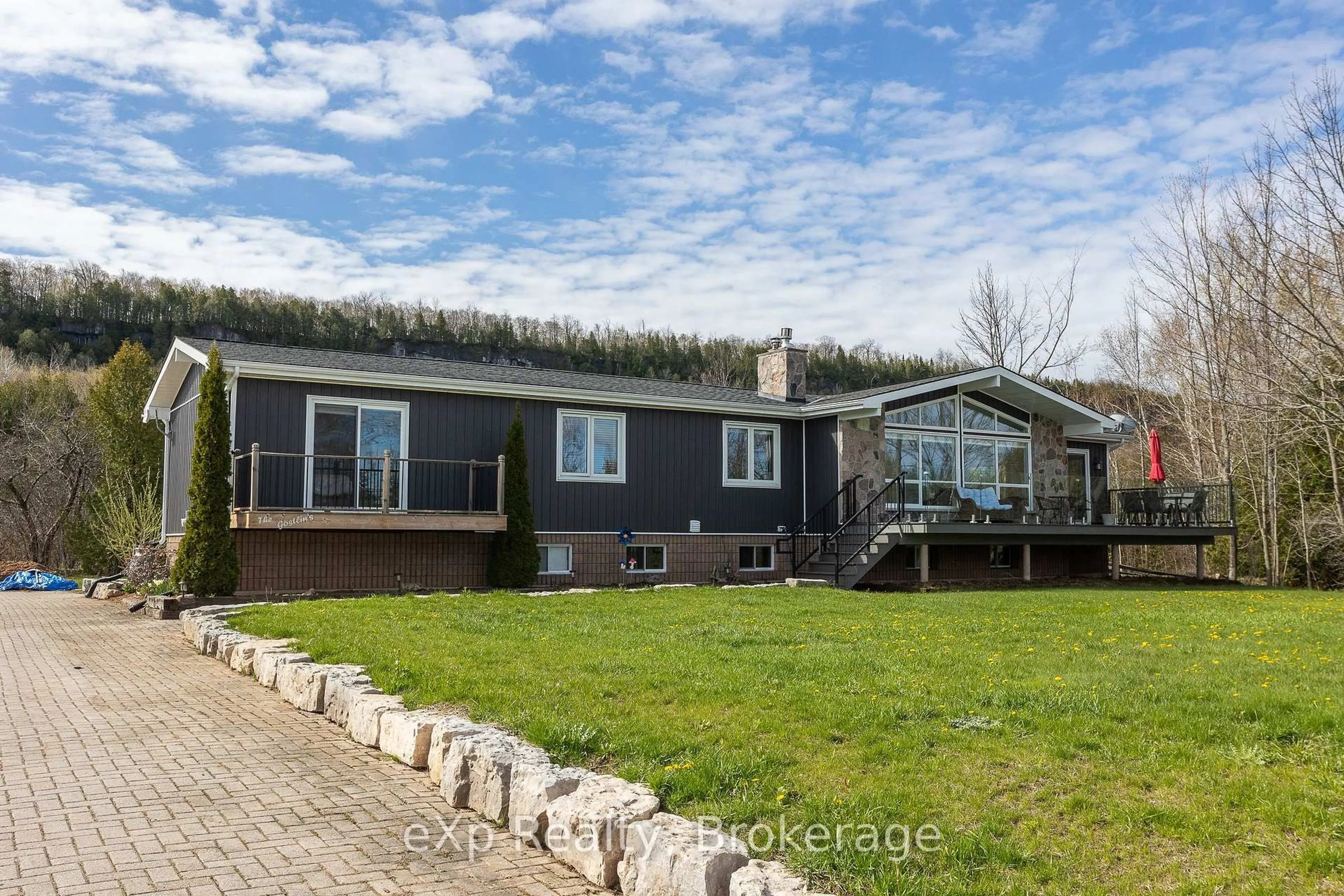 A pic from outside/outdoor area/front of a property/back of a property/a pic from drone, unknown for 502754 Grey Road 1, Georgian Bluffs Ontario N0H 2T0