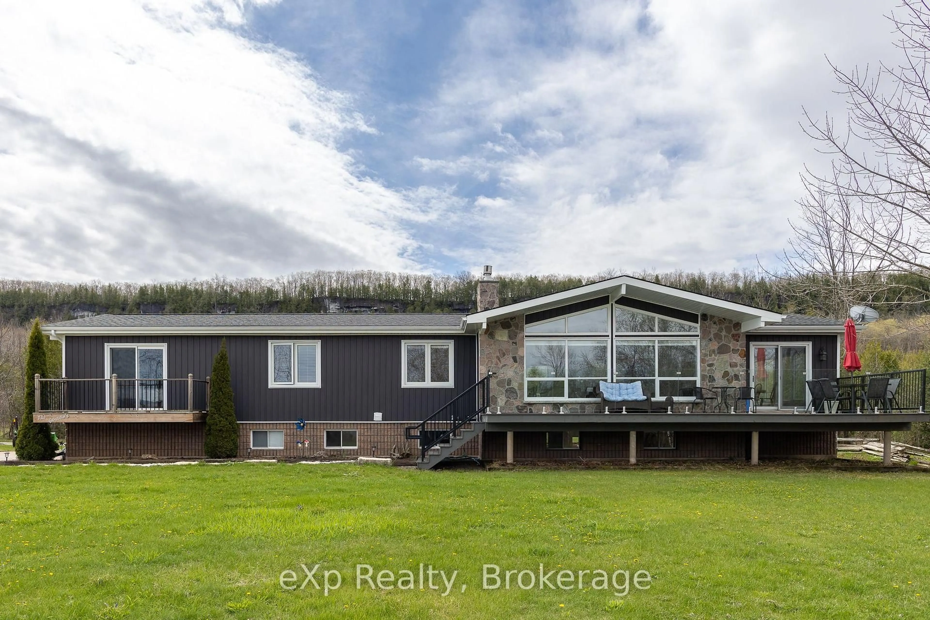 A pic from outside/outdoor area/front of a property/back of a property/a pic from drone, water/lake/river/ocean view for 502754 Grey Road 1, Georgian Bluffs Ontario N0H 2T0