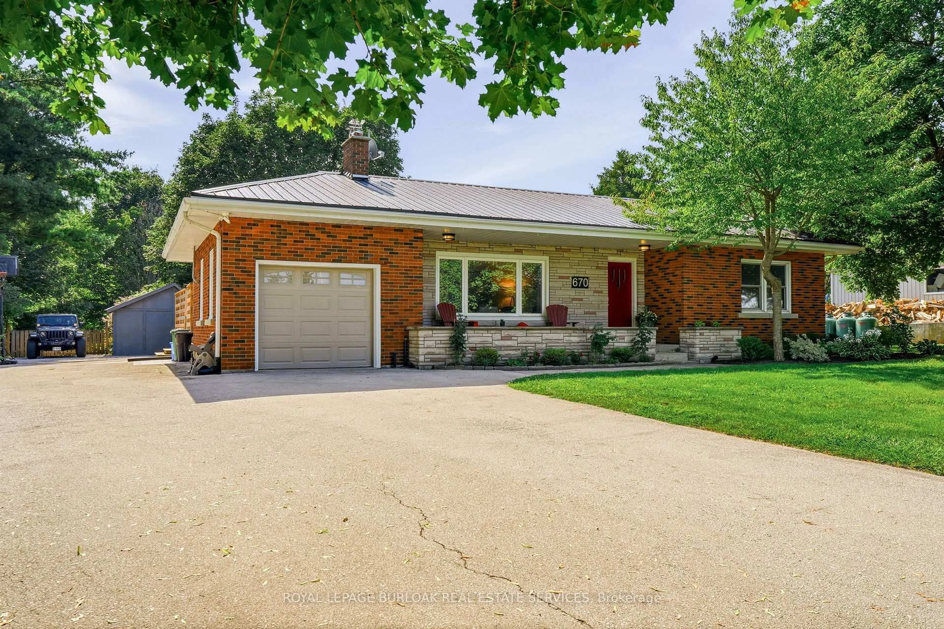 Home with brick exterior material, street for 670 Thompson Rd, Hamilton Ontario L0R 2B0