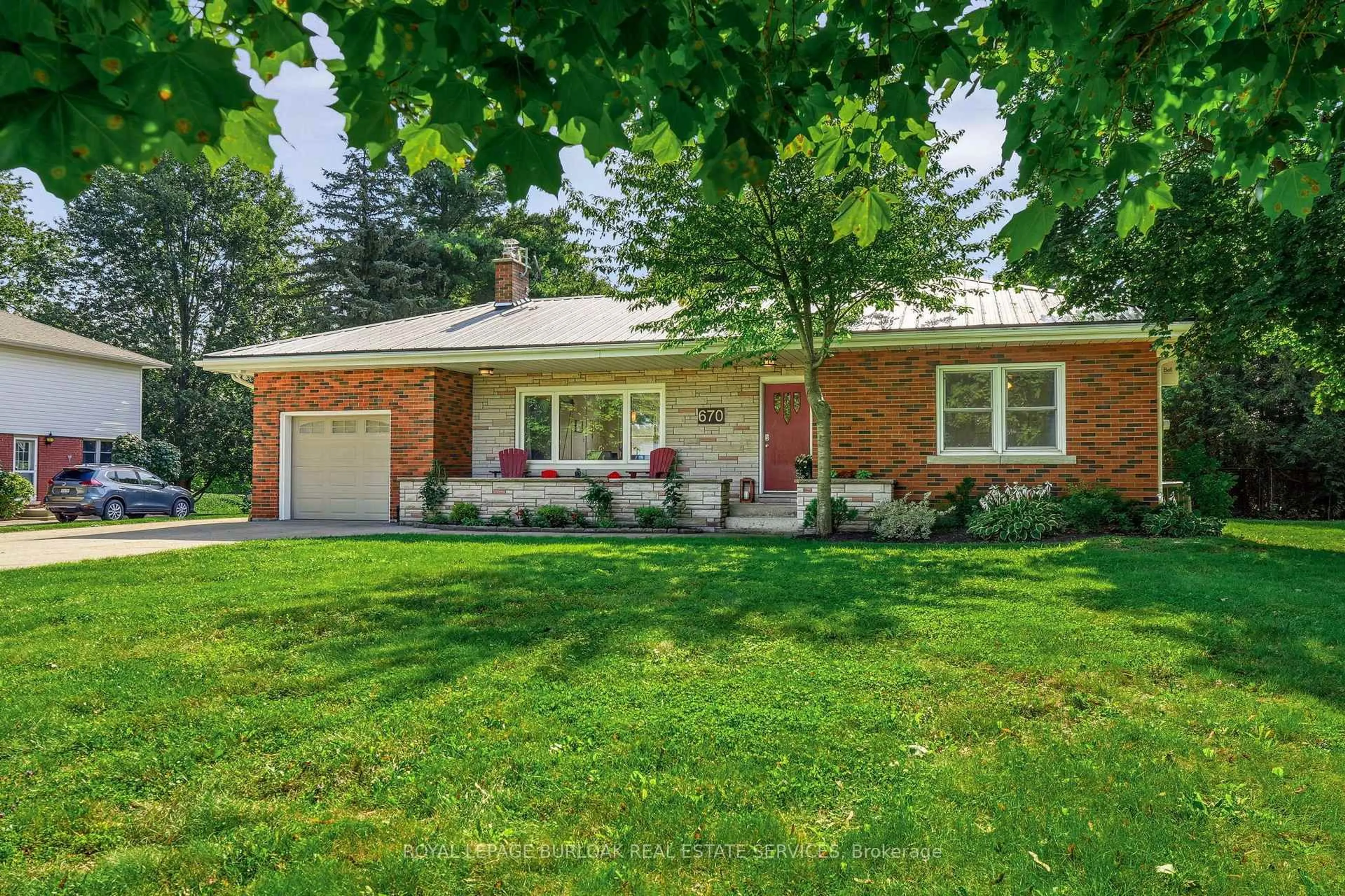 Home with brick exterior material, street for 670 Thompson Rd, Hamilton Ontario L0R 2B0