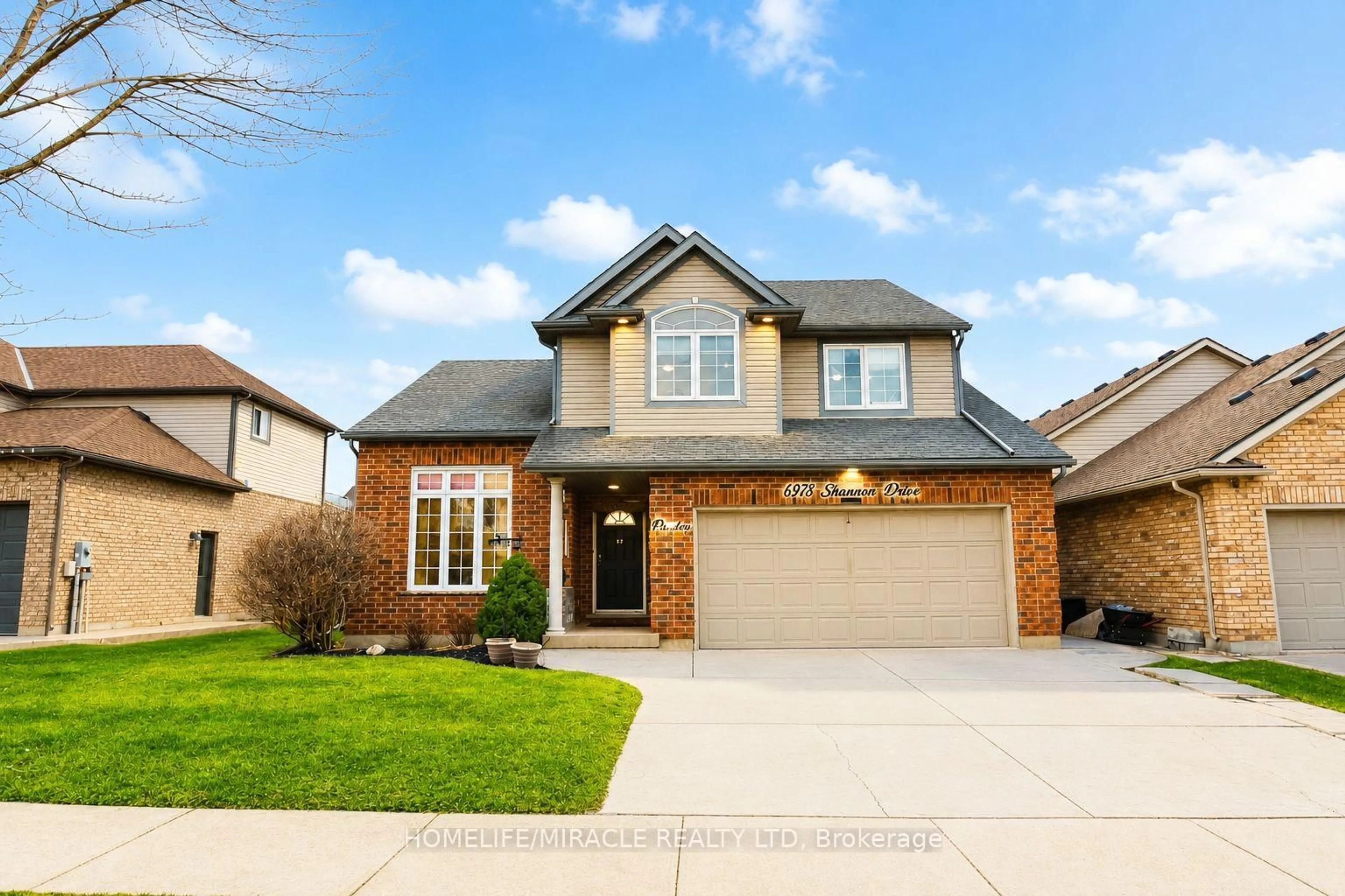 Home with brick exterior material, street for 6978 Shannon Dr, Niagara Falls Ontario L2H 3N7