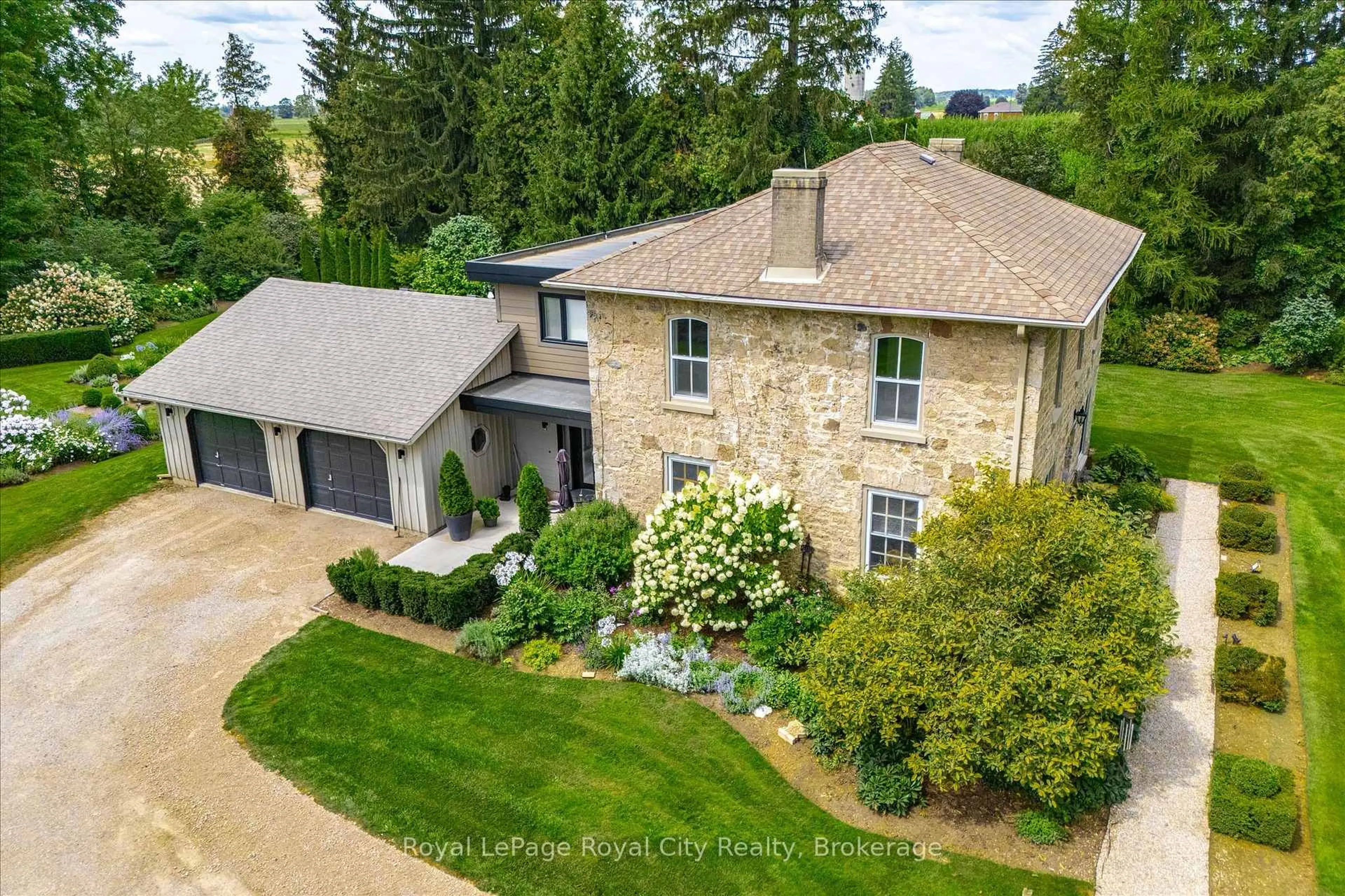 A pic from outside/outdoor area/front of a property/back of a property/a pic from drone, street for 6550 Gerrie Rd, Centre Wellington Ontario N0B 1S0