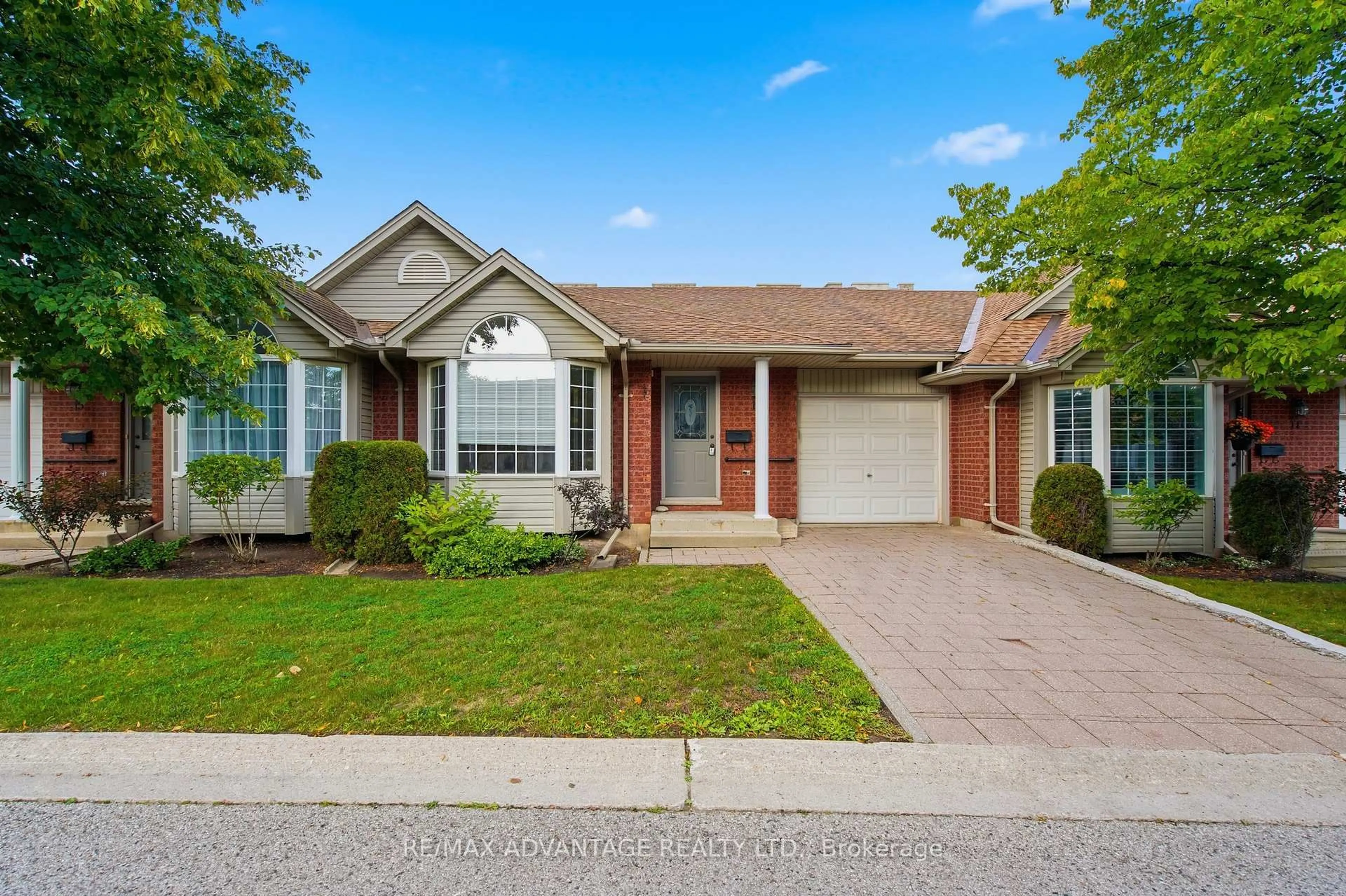 Home with brick exterior material, street for 122 Sherwood Forest Sq #18, London North Ontario N6G 5G8