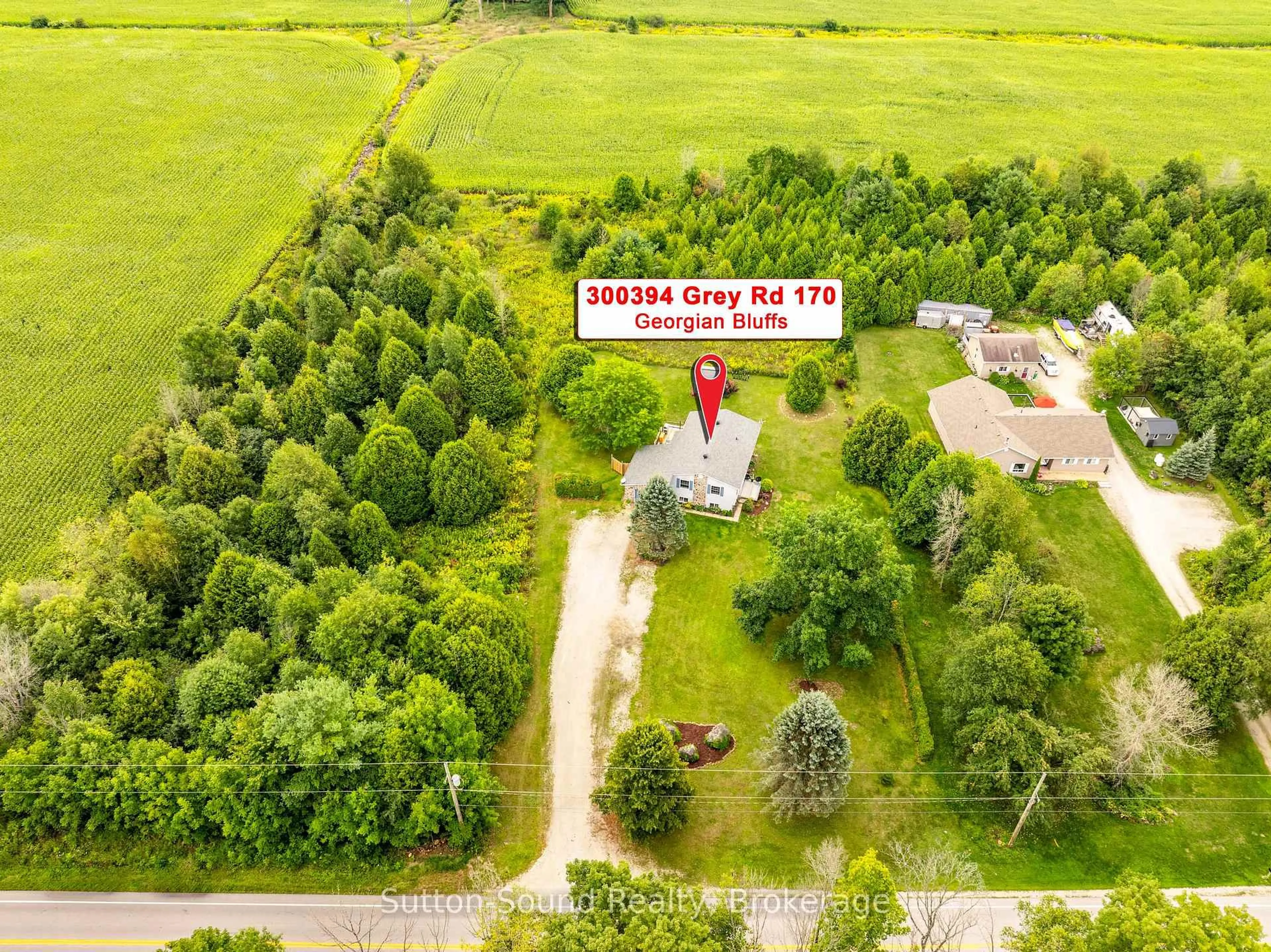 A pic from outside/outdoor area/front of a property/back of a property/a pic from drone, unknown for 300394 Grey Road 170 Rd, Georgian Bluffs Ontario N0H 2K0