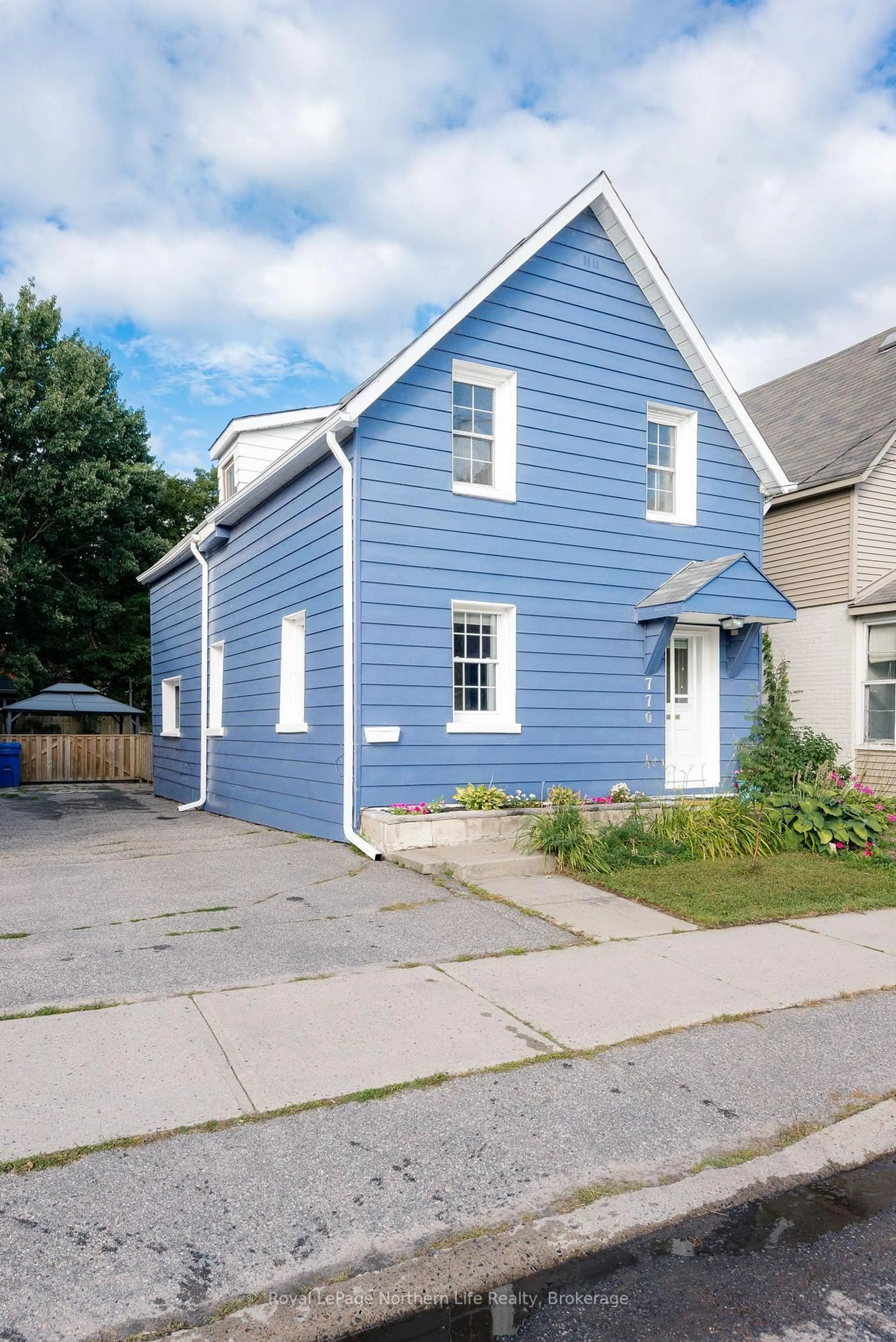 Home with vinyl exterior material, street for 770 Main St, North Bay Ontario P1B 2V7