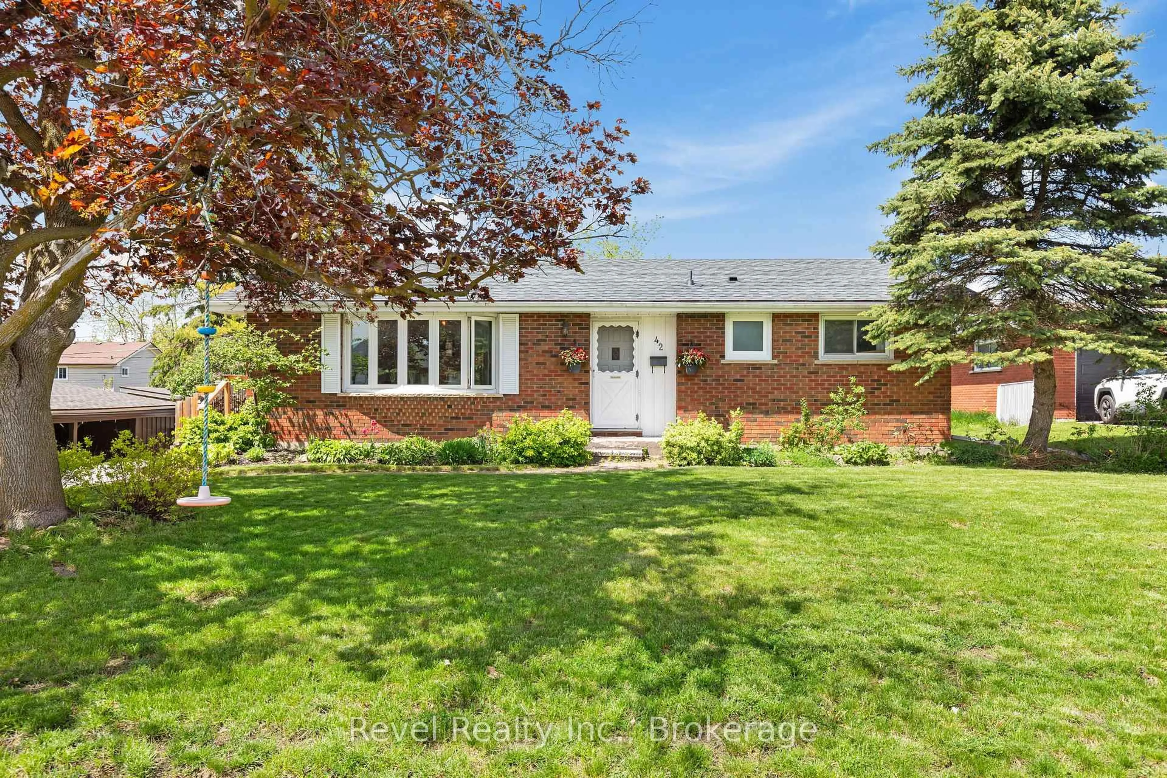 Home with brick exterior material, street for 42 Kawartha Dr, Kawartha Lakes Ontario K9V 1A5