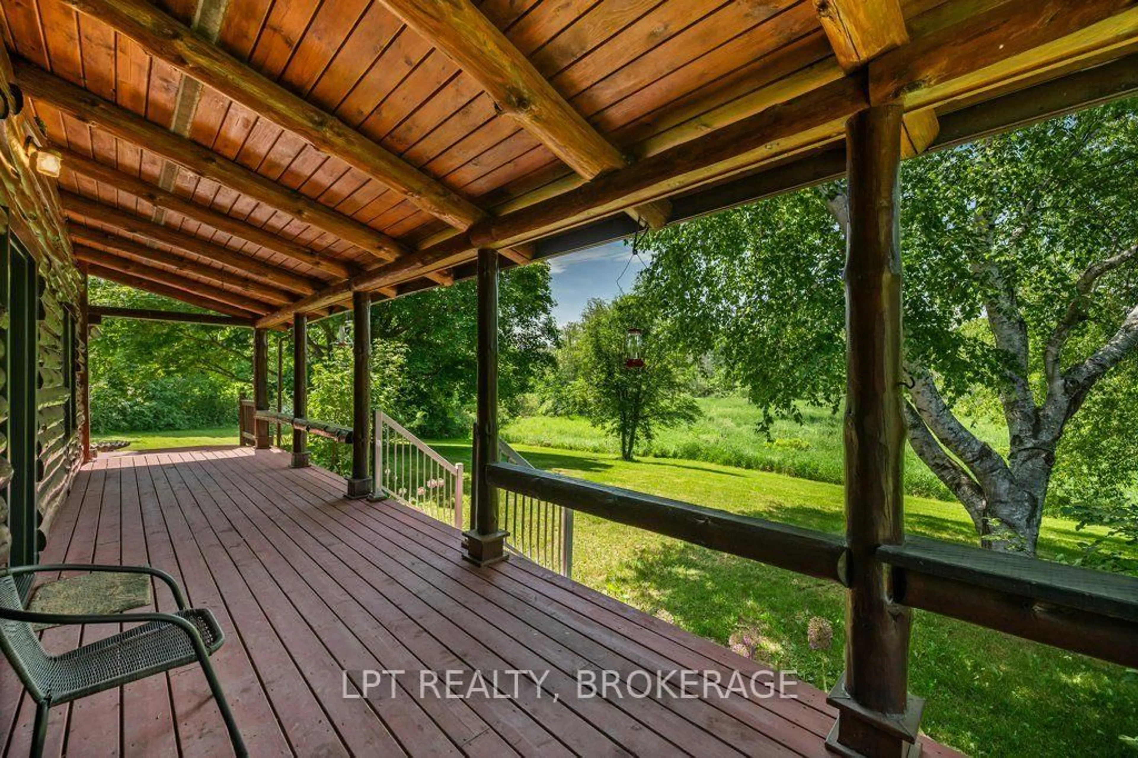 A pic from outside/outdoor area/front of a property/back of a property/a pic from drone, water/lake/river/ocean view for 1922 Dover Rd, Mcdonalds Corners Ontario K0H 1M0