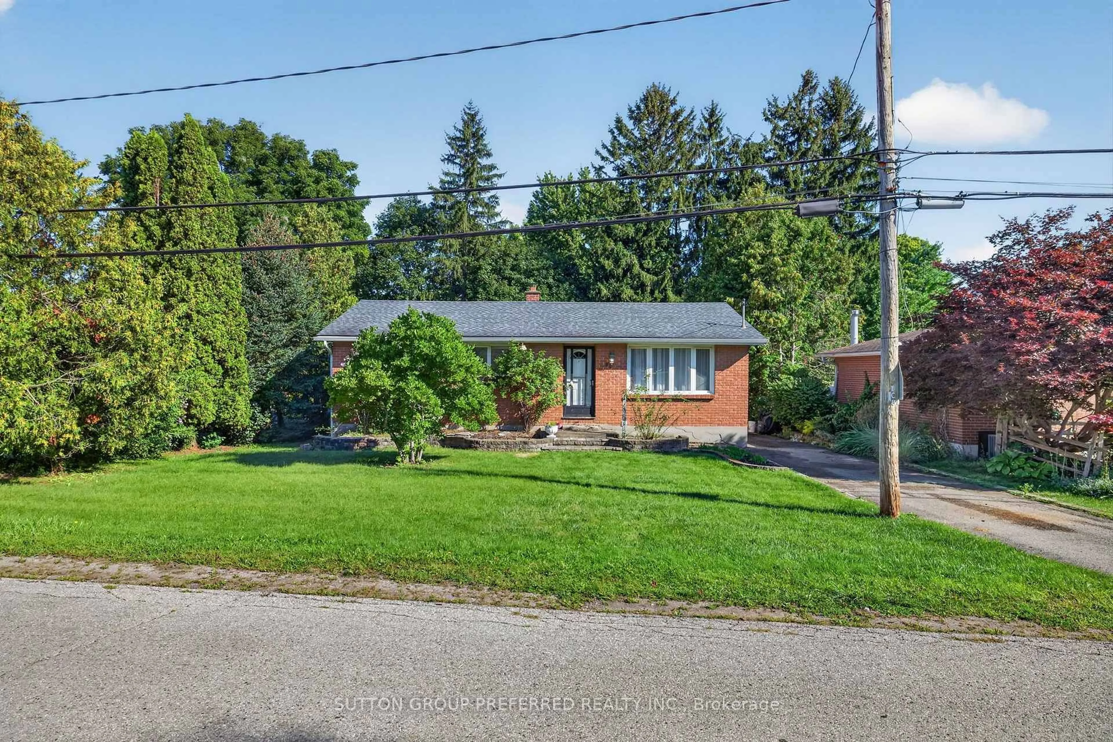 Home with brick exterior material, street for 98 Queen St, Thames Centre Ontario N0L 1G2