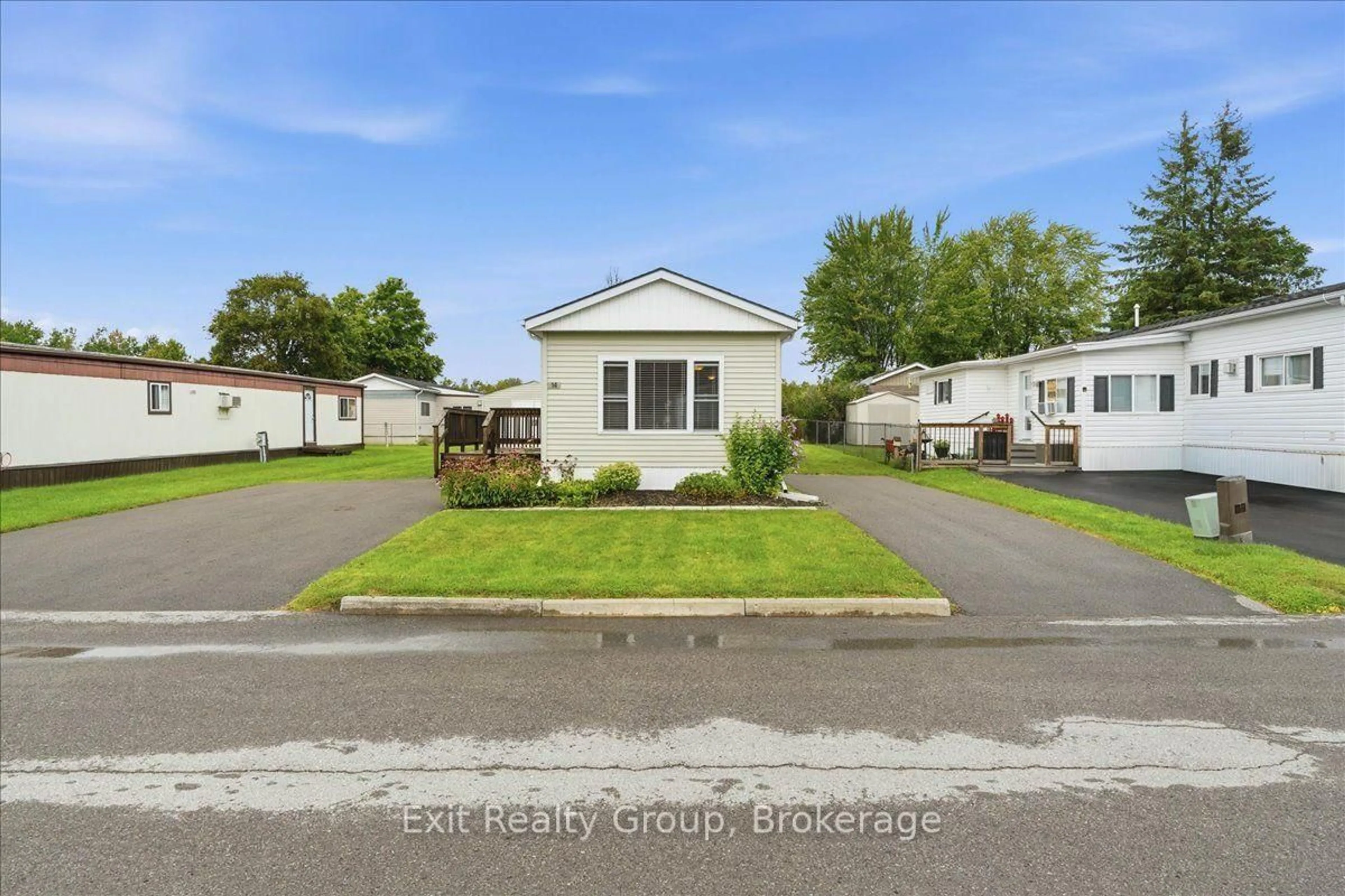 Home with vinyl exterior material, street for 14 Nightingale Lane, Quinte West Ontario K8N 4Z3