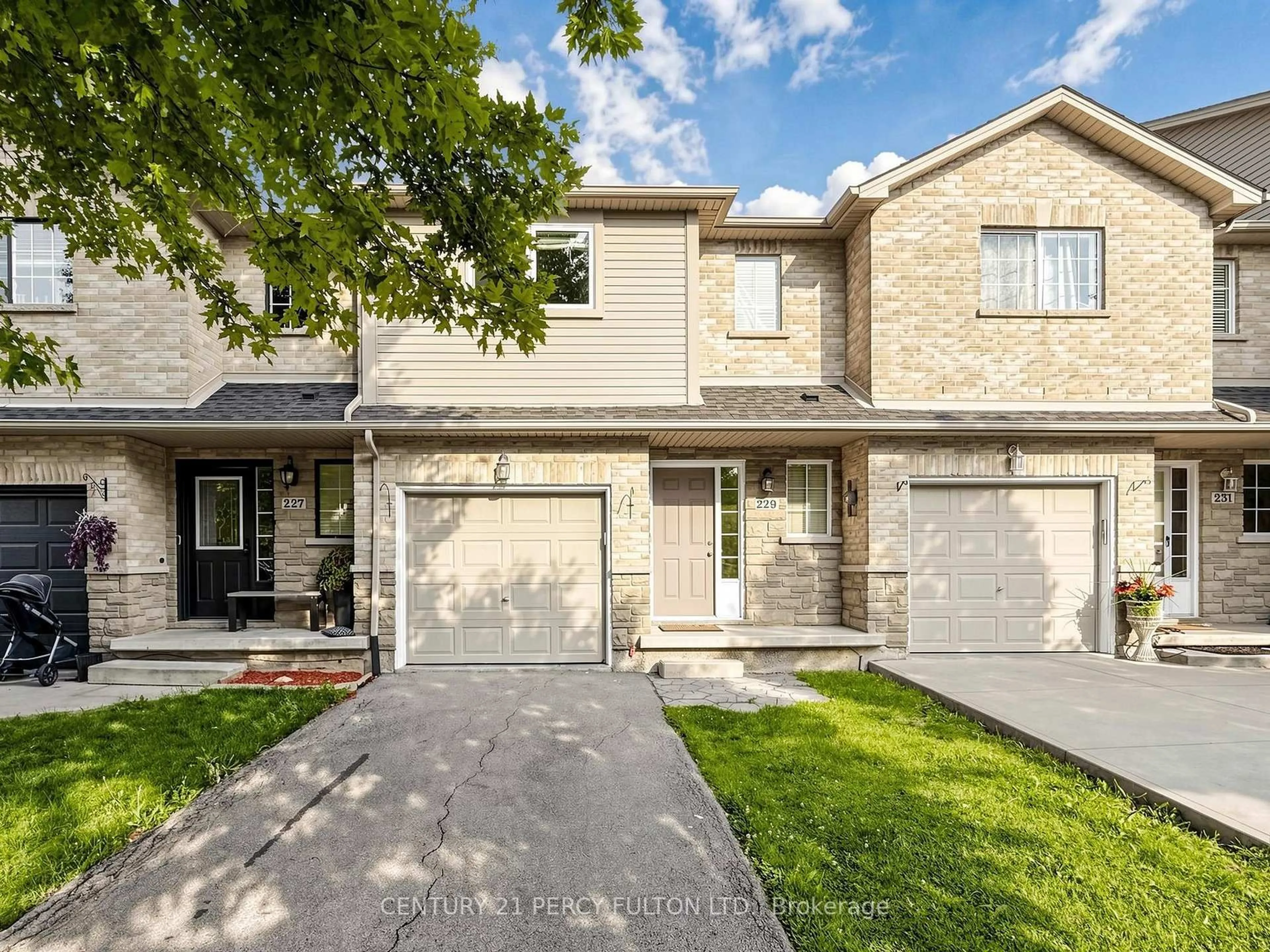 Home with brick exterior material, street for 229 Dicenzo Dr, Hamilton Ontario L9B 2X7