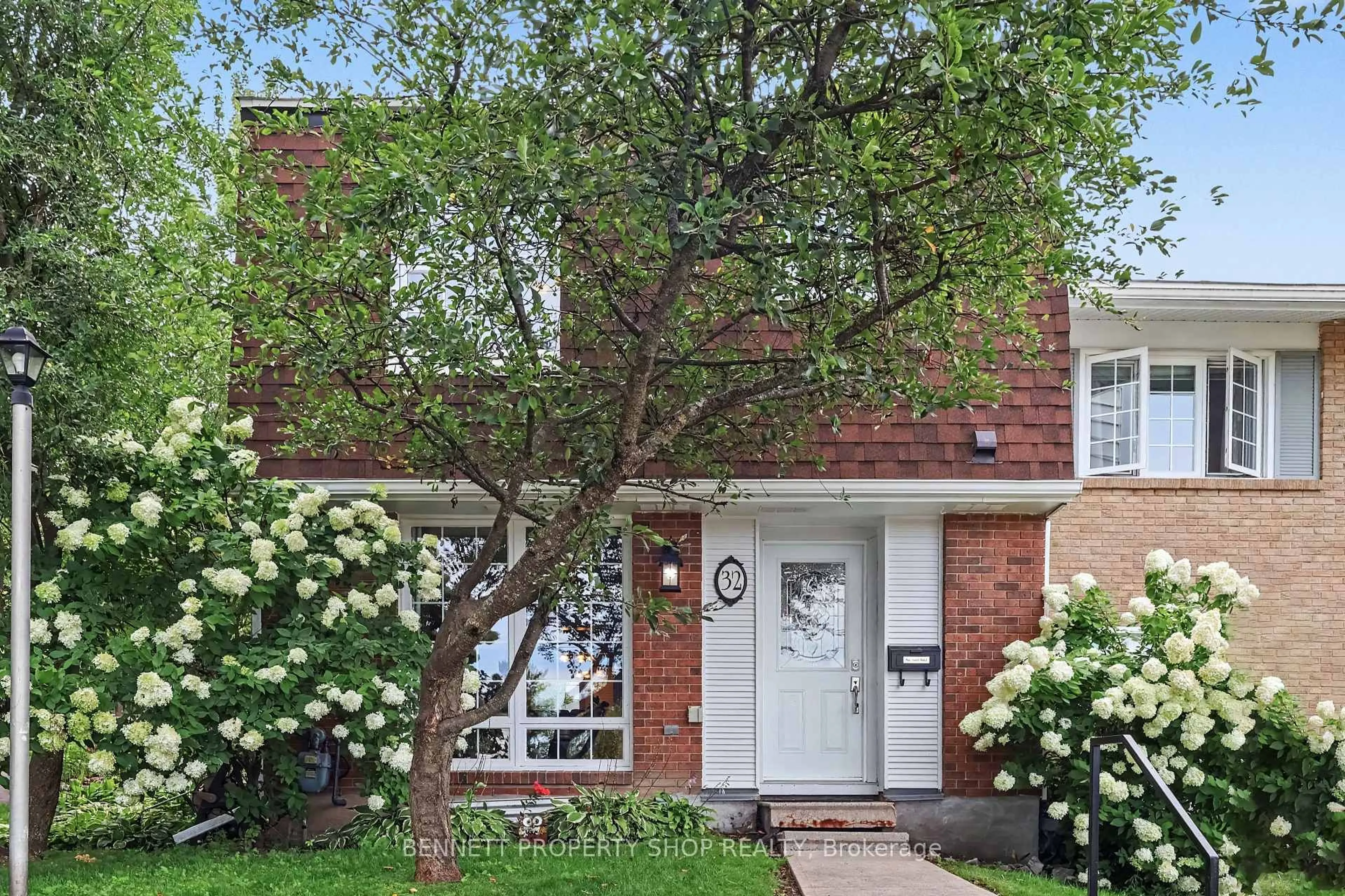 Home with brick exterior material, street for 2300 Ogilvie Rd #32, Ottawa Ontario K1J 7X8