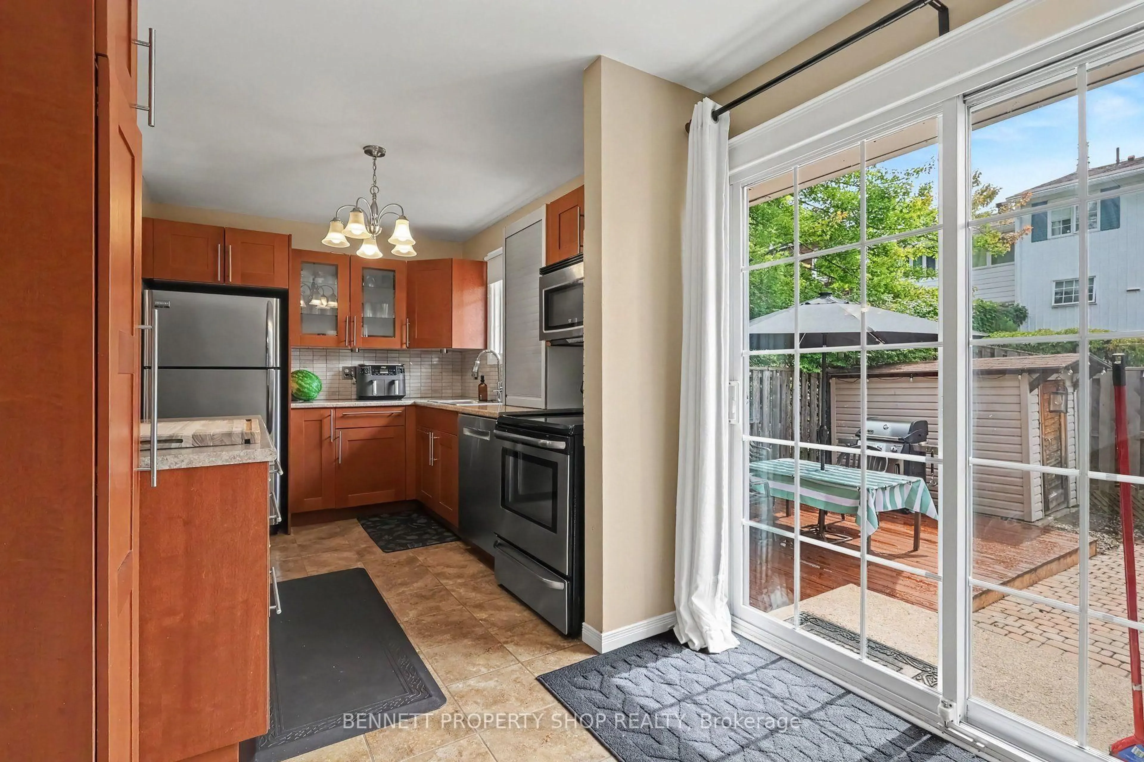 Open concept kitchen, ceramic/tile floor for 2300 Ogilvie Rd #32, Ottawa Ontario K1J 7X8