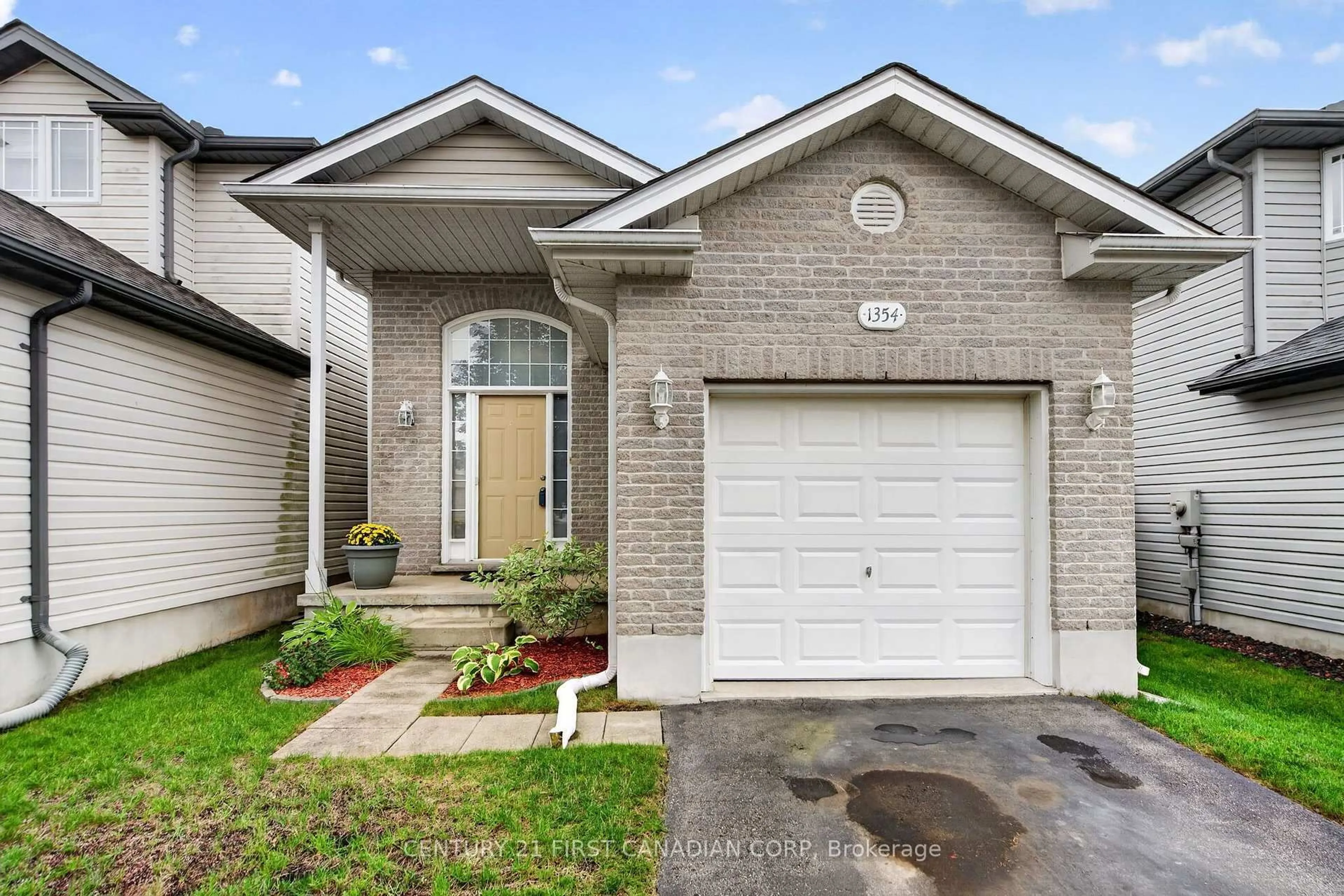 Home with brick exterior material, street for 1354 Aspenridge Cres, London East Ontario N5Y 5P1
