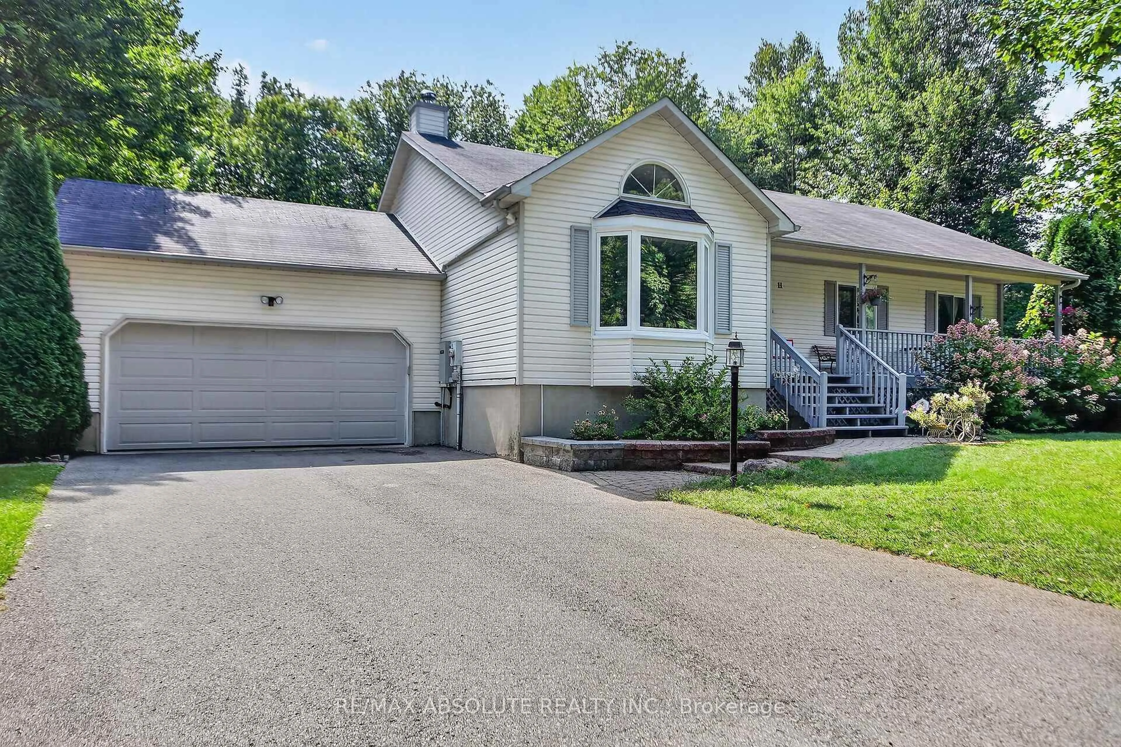 Home with vinyl exterior material, street for 11 Flesher Cres, North Grenville Ontario K0G 1J0
