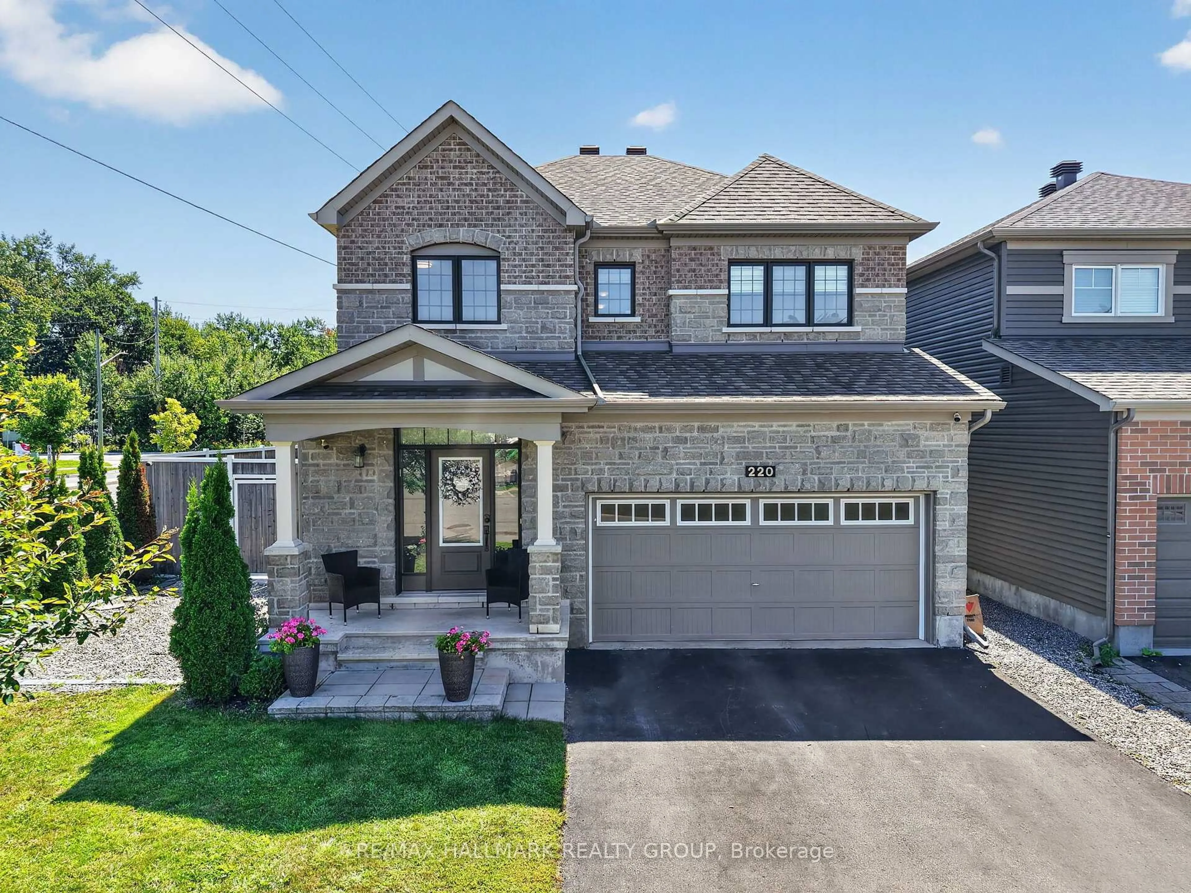 Home with brick exterior material, street for 220 Enclave Walk, Ottawa Ontario K1W 0J4