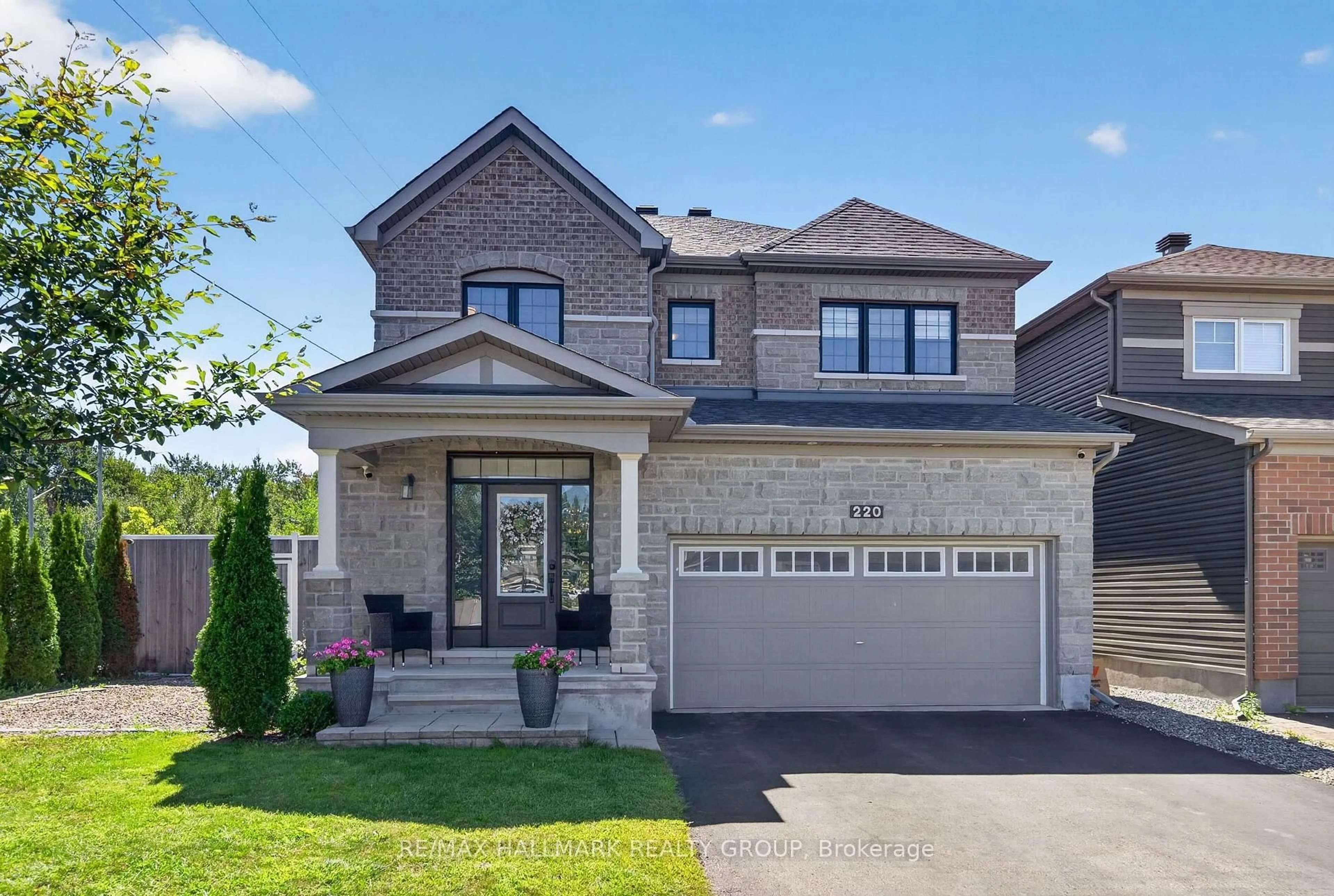 Home with brick exterior material, street for 220 Enclave Walk, Ottawa Ontario K1W 0J4