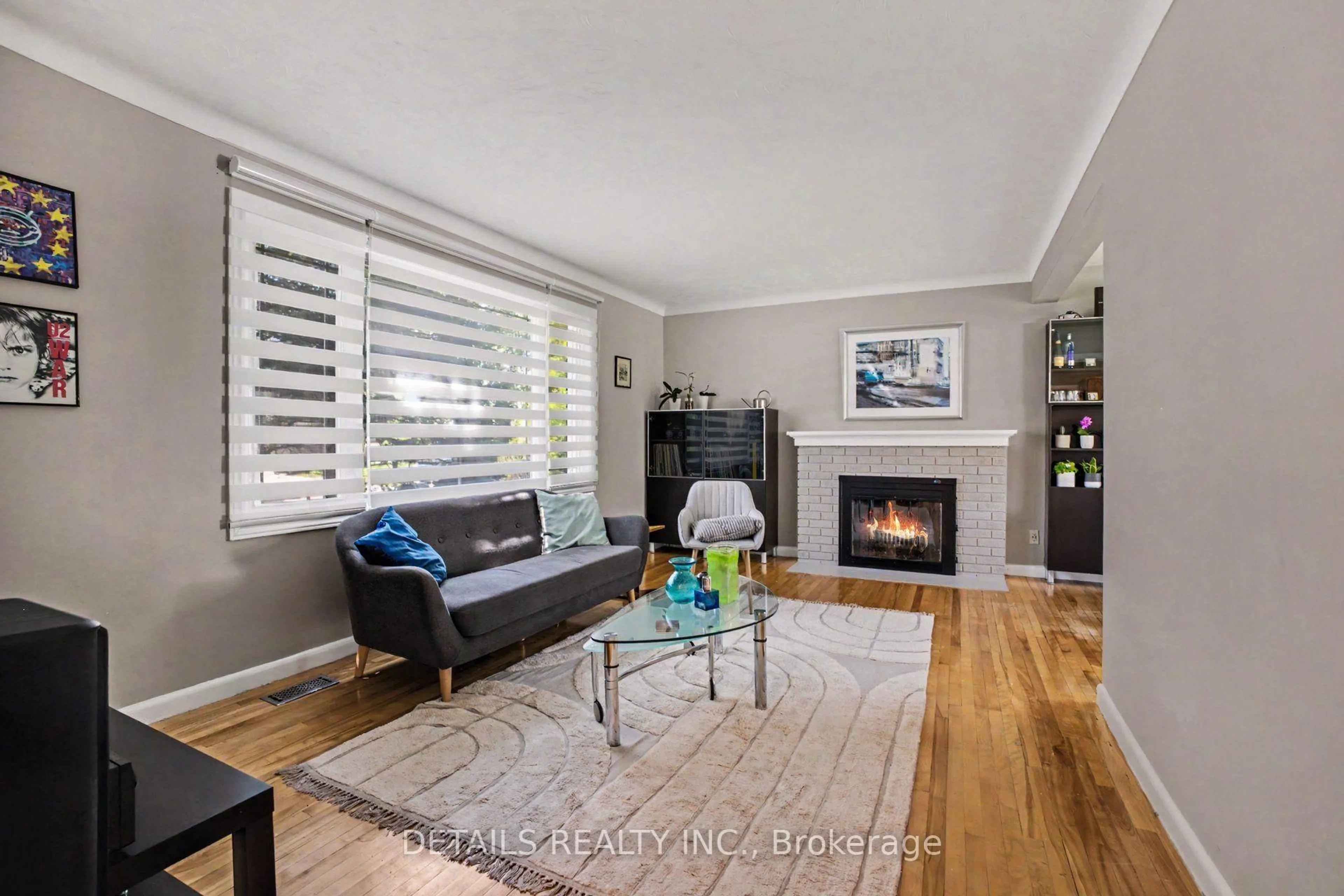 Living room with furniture, wood/laminate floor for 1233 Checkers Rd, Ottawa Ontario K2C 2S8