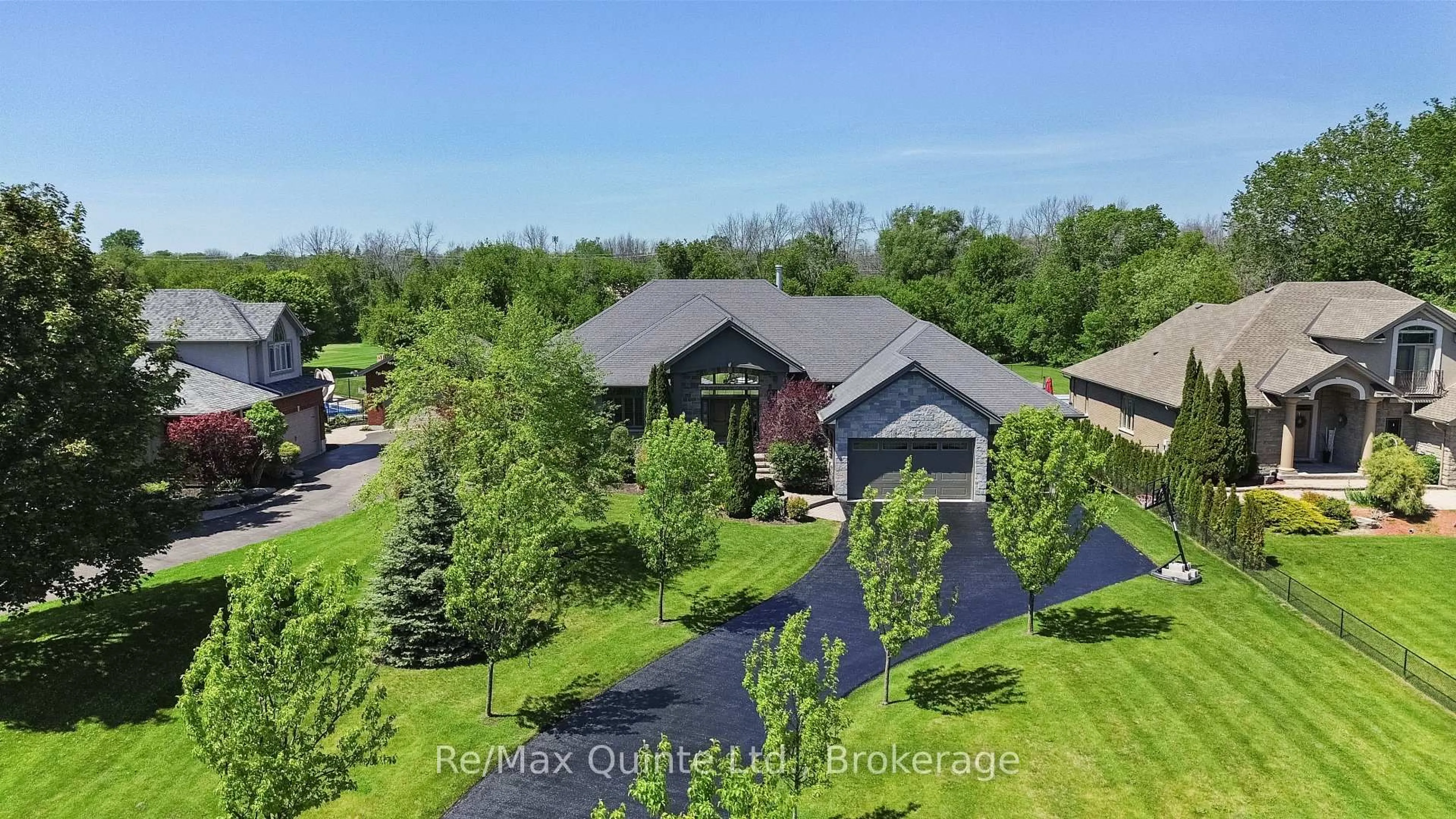 A pic from outside/outdoor area/front of a property/back of a property/a pic from drone, water/lake/river/ocean view for 54 Settlers Landing Dr, Quinte West Ontario K8R 0A9