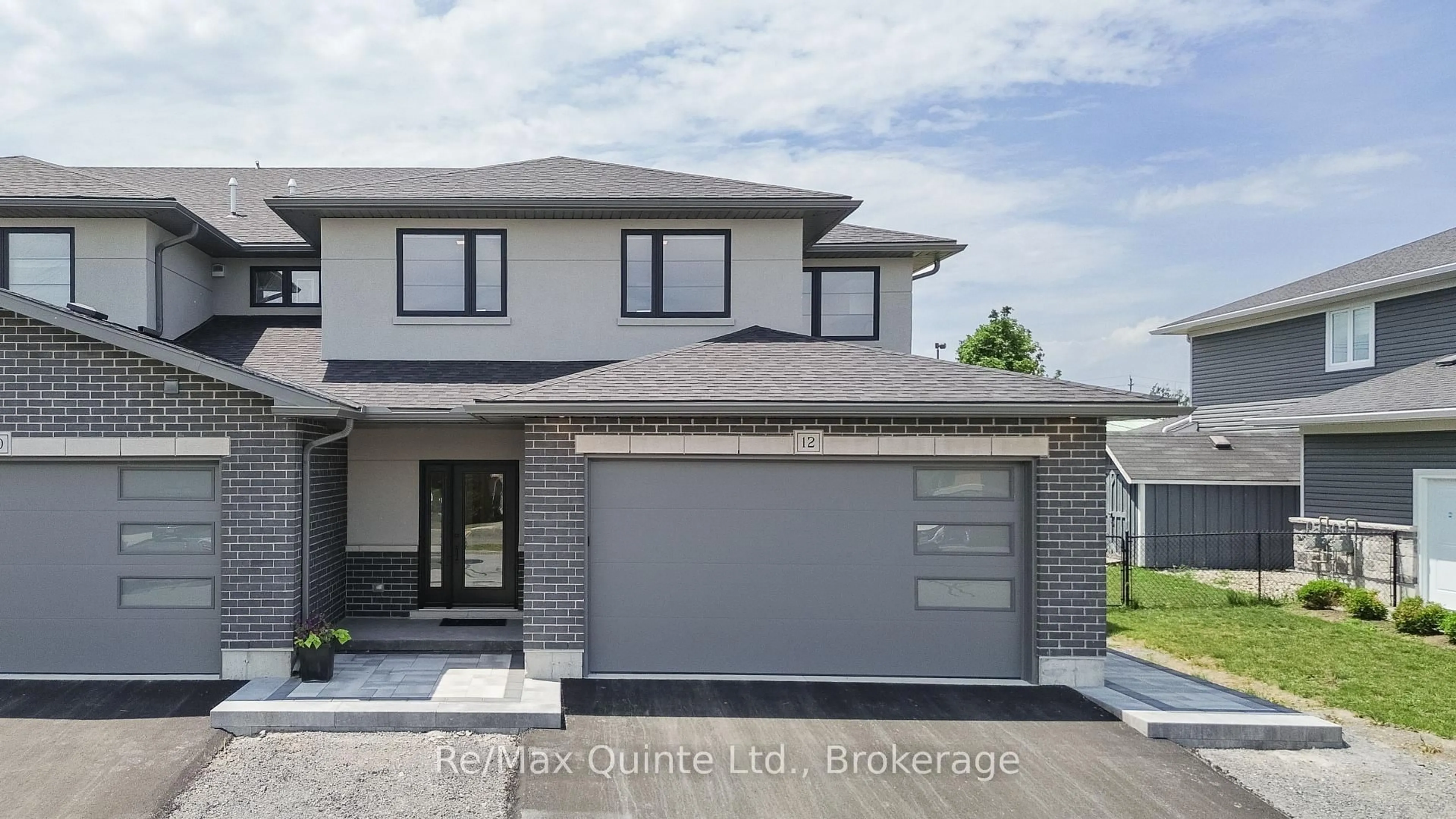 Home with brick exterior material, street for 12 Stinson Ave, Belleville Ontario K8P 5N9