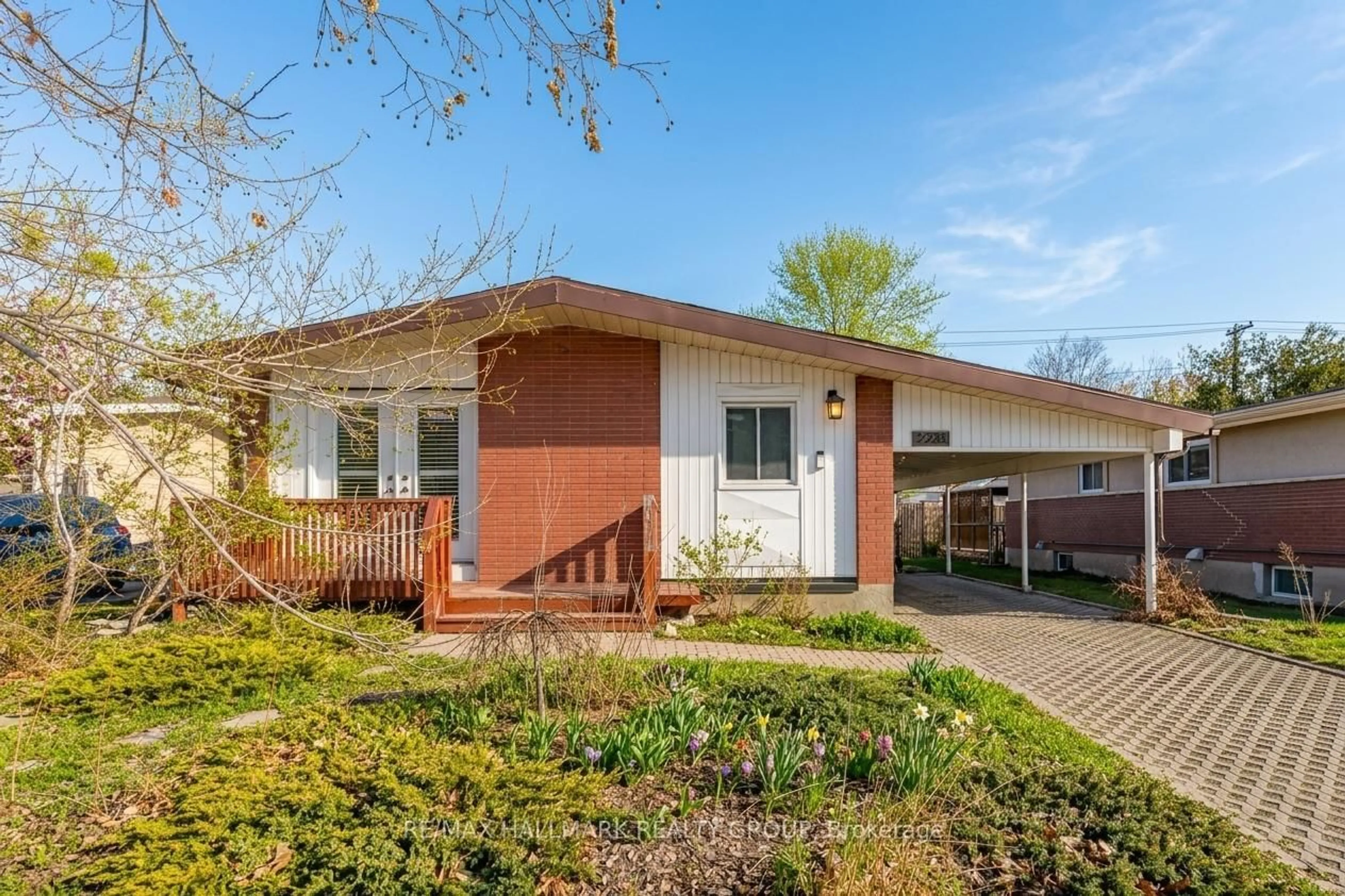 Home with brick exterior material, street for 2223 Halifax Dr, Ottawa Ontario K1G 2W4