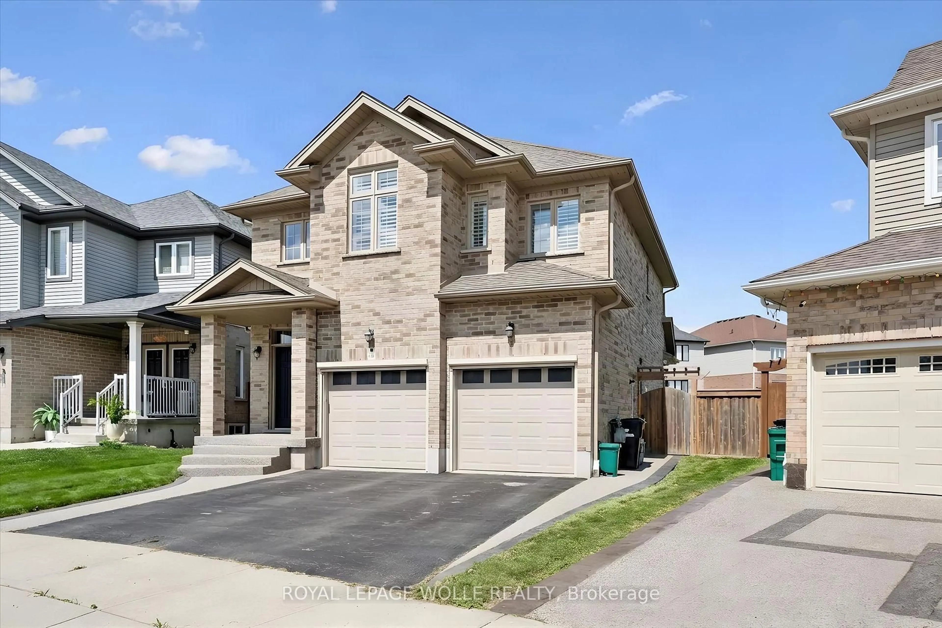 Home with brick exterior material, street for 941 Eden Oak Crt, Kitchener Ontario N2A 0H4