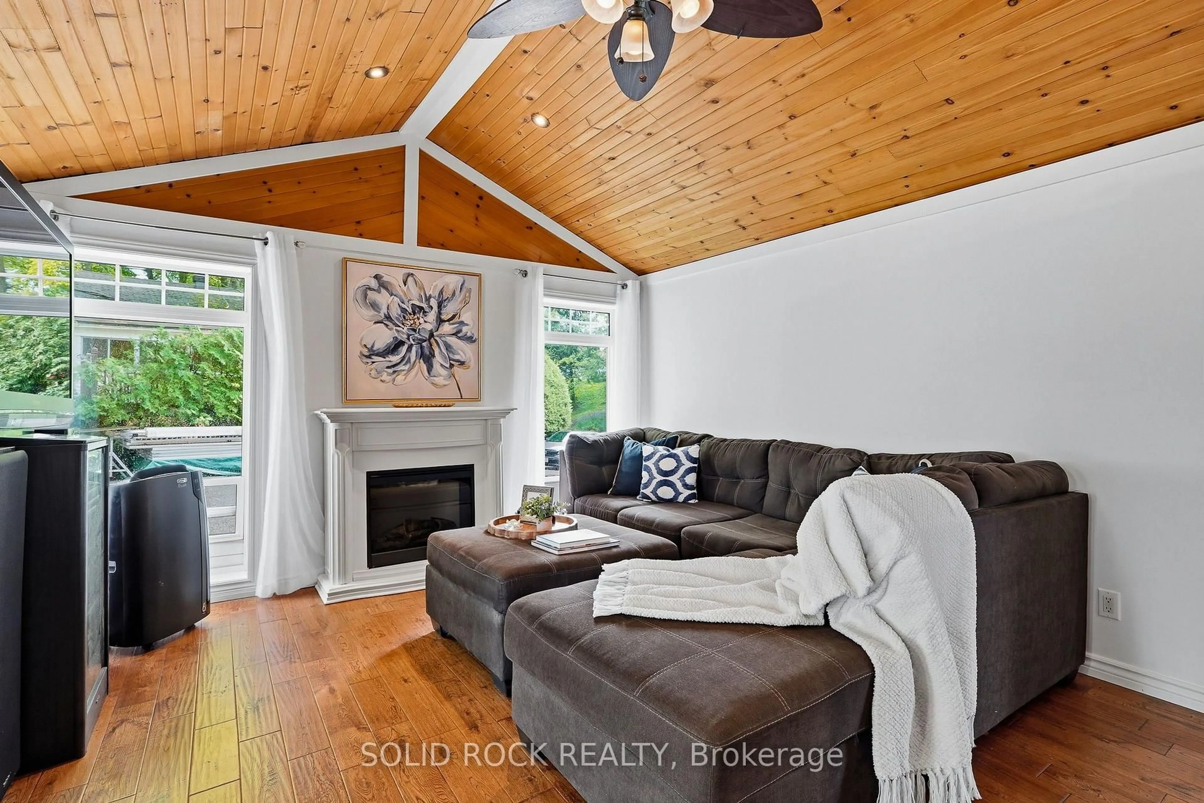Living room with furniture, wood/laminate floor for 3435 Old Highway 17 Rd #41, Clarence-Rockland Ontario K4K 1W1