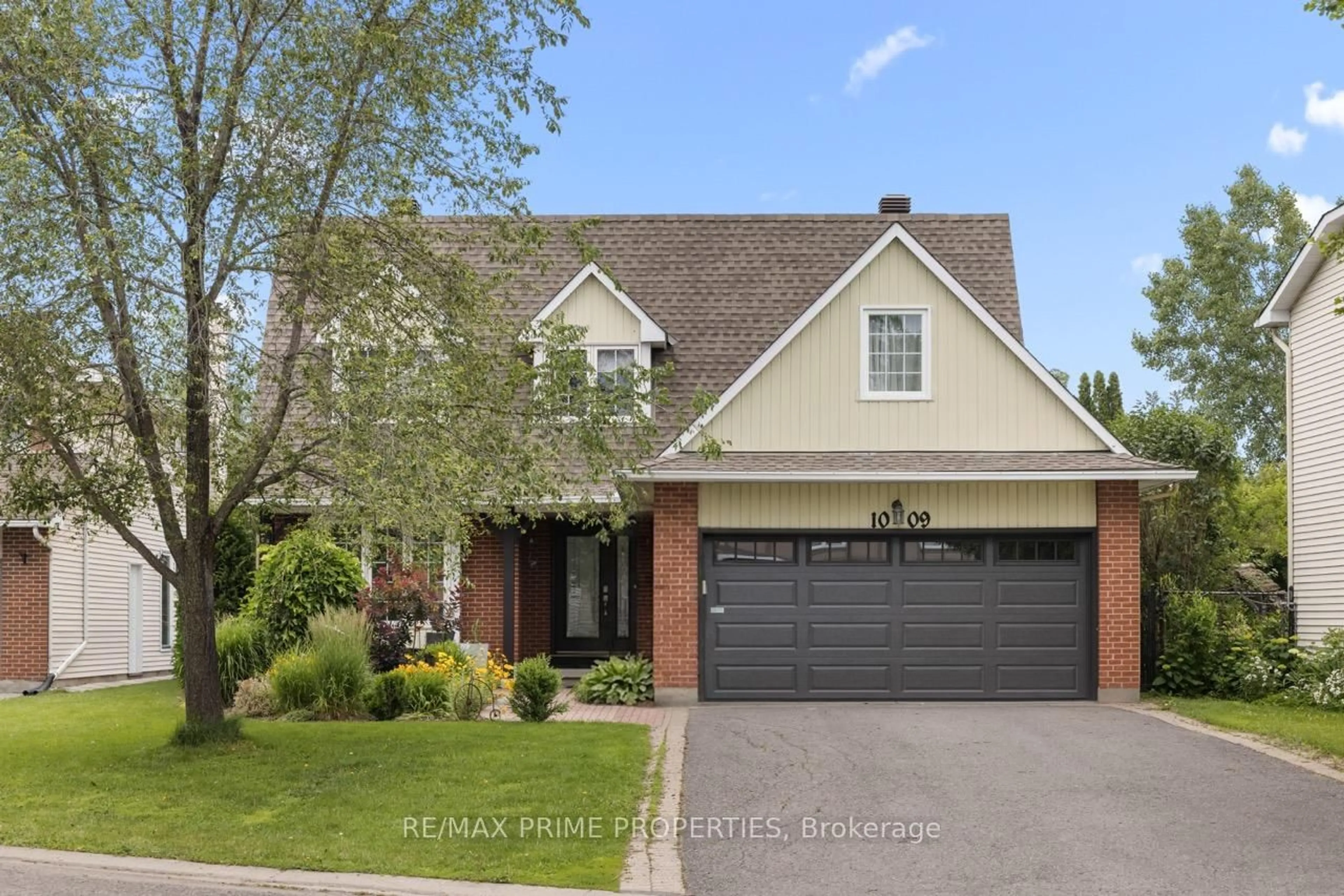 Home with brick exterior material, street for 1009 Driftwood Cres, Orleans Ontario K1C 2N9