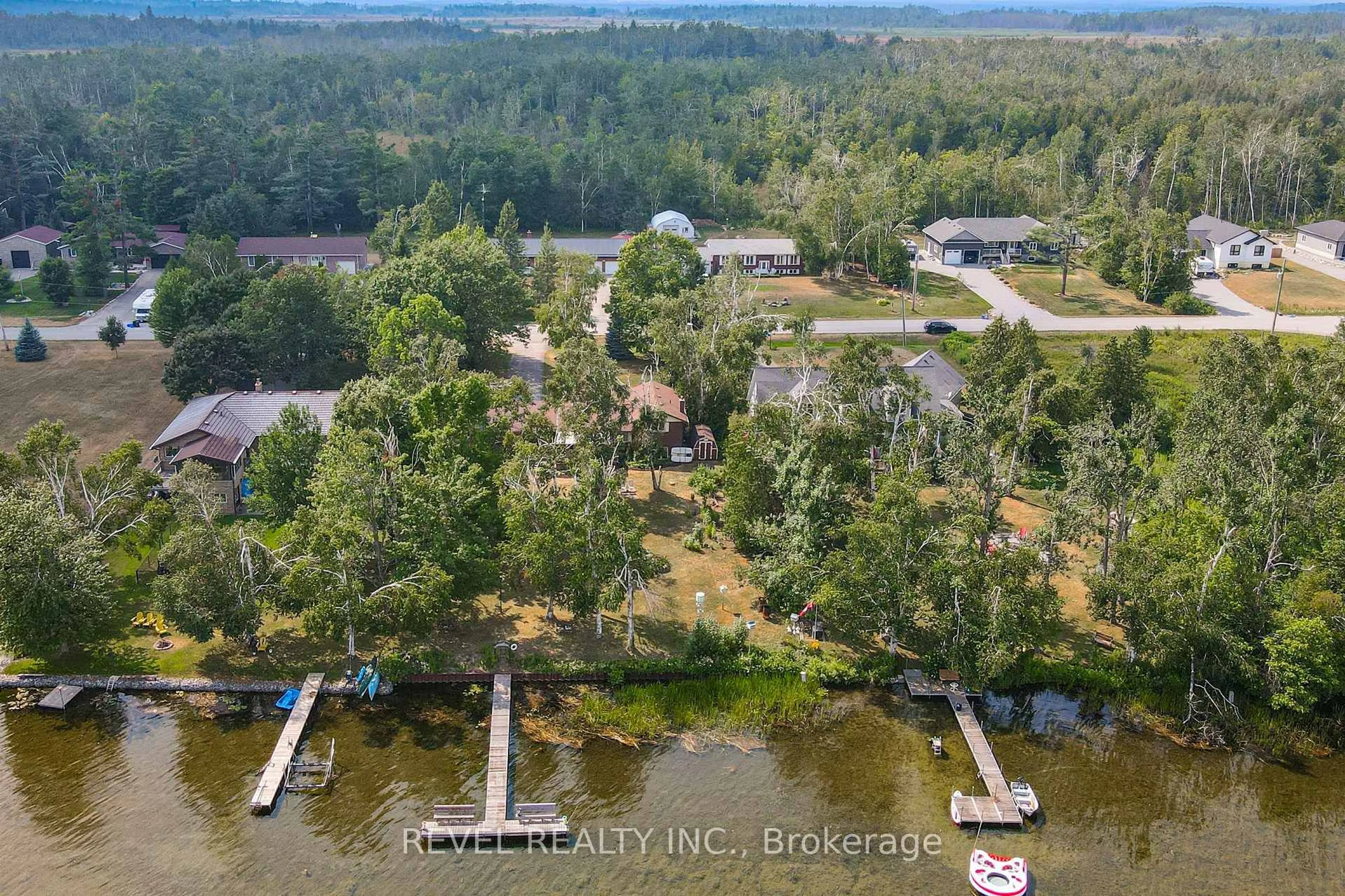 A pic from outside/outdoor area/front of a property/back of a property/a pic from drone, water/lake/river/ocean view for 126 Pinewood Blvd, Kawartha Lakes Ontario K0M 2T0