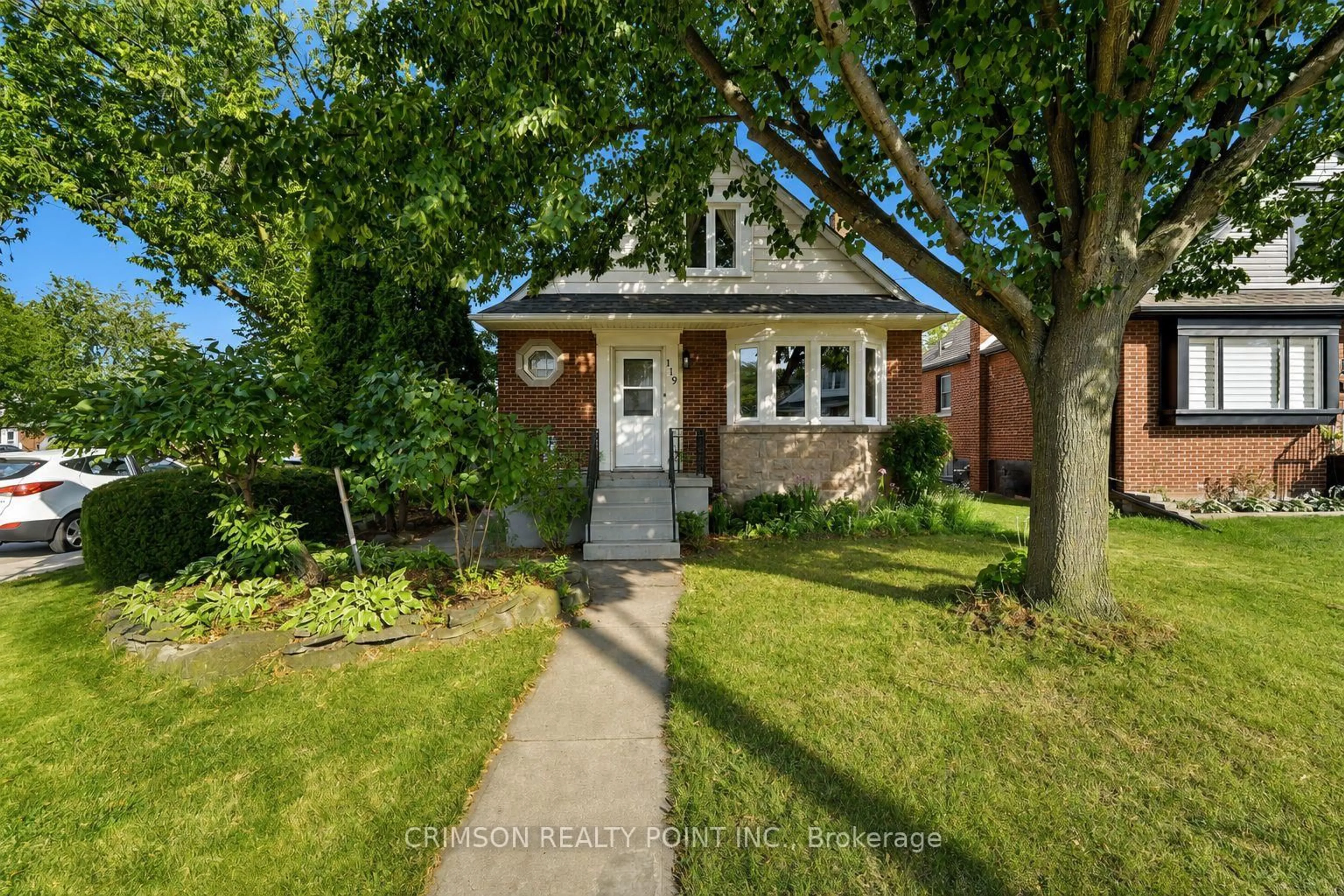 Home with brick exterior material, street for 119 Rodgers Rd, Hamilton Ontario L8K 3C1