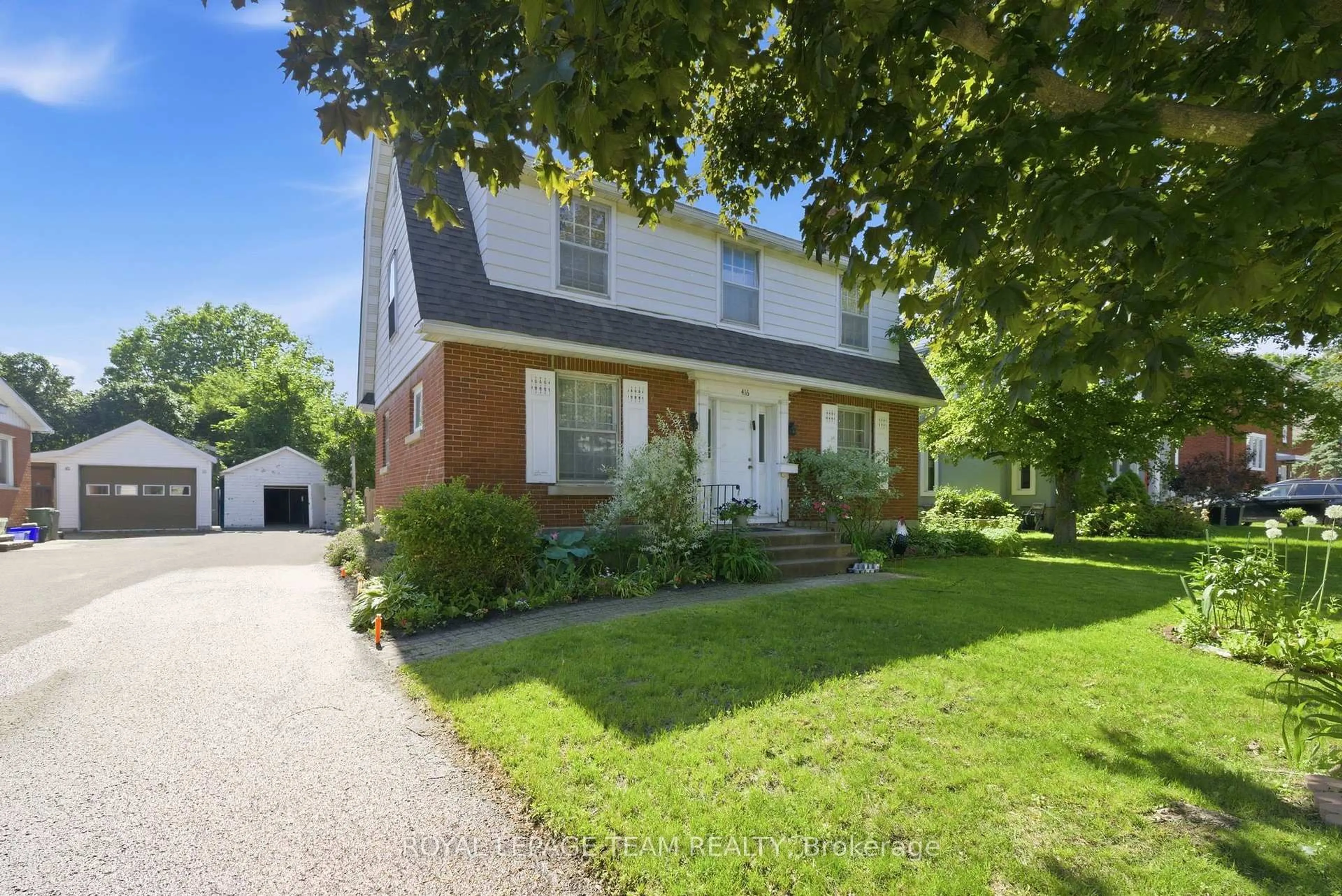 Home with brick exterior material, street for 416 Tweedsmuir Ave, Ottawa Ontario K1Z 5N5