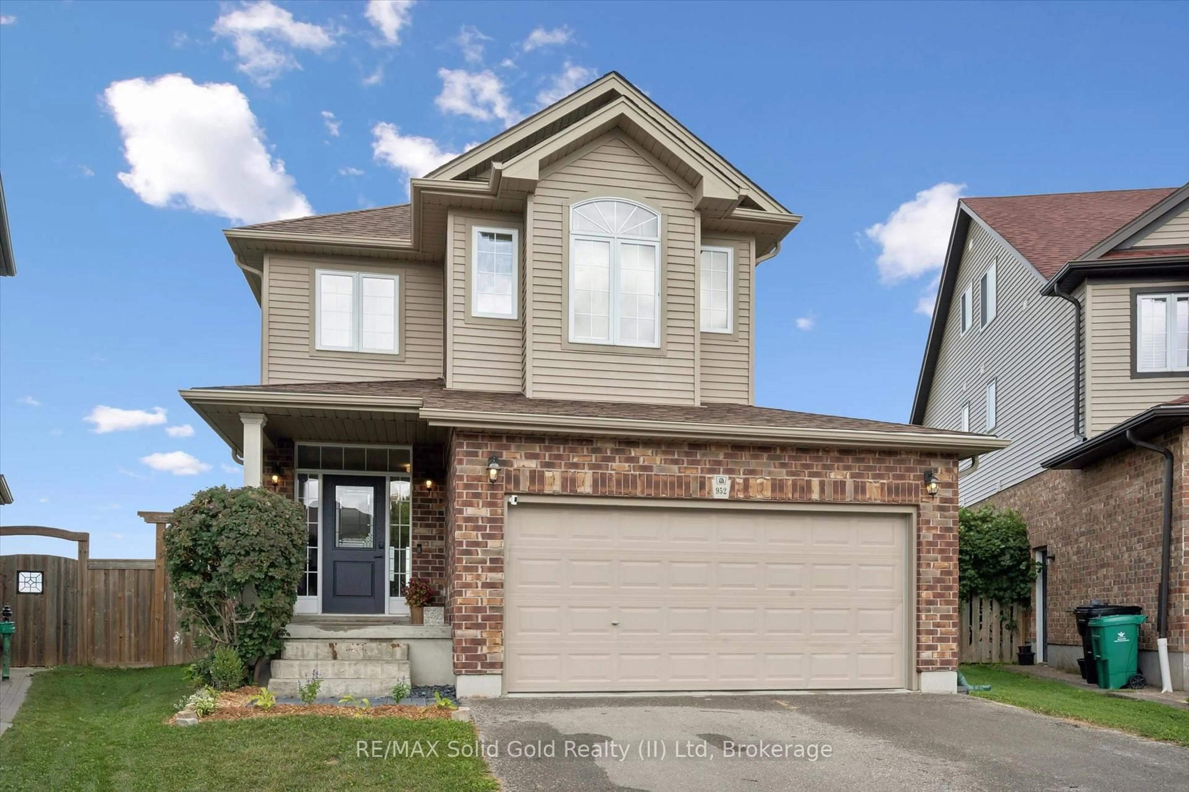 Home with brick exterior material, street for 952 Eden Oak Crt, Kitchener Ontario N2A 0C6