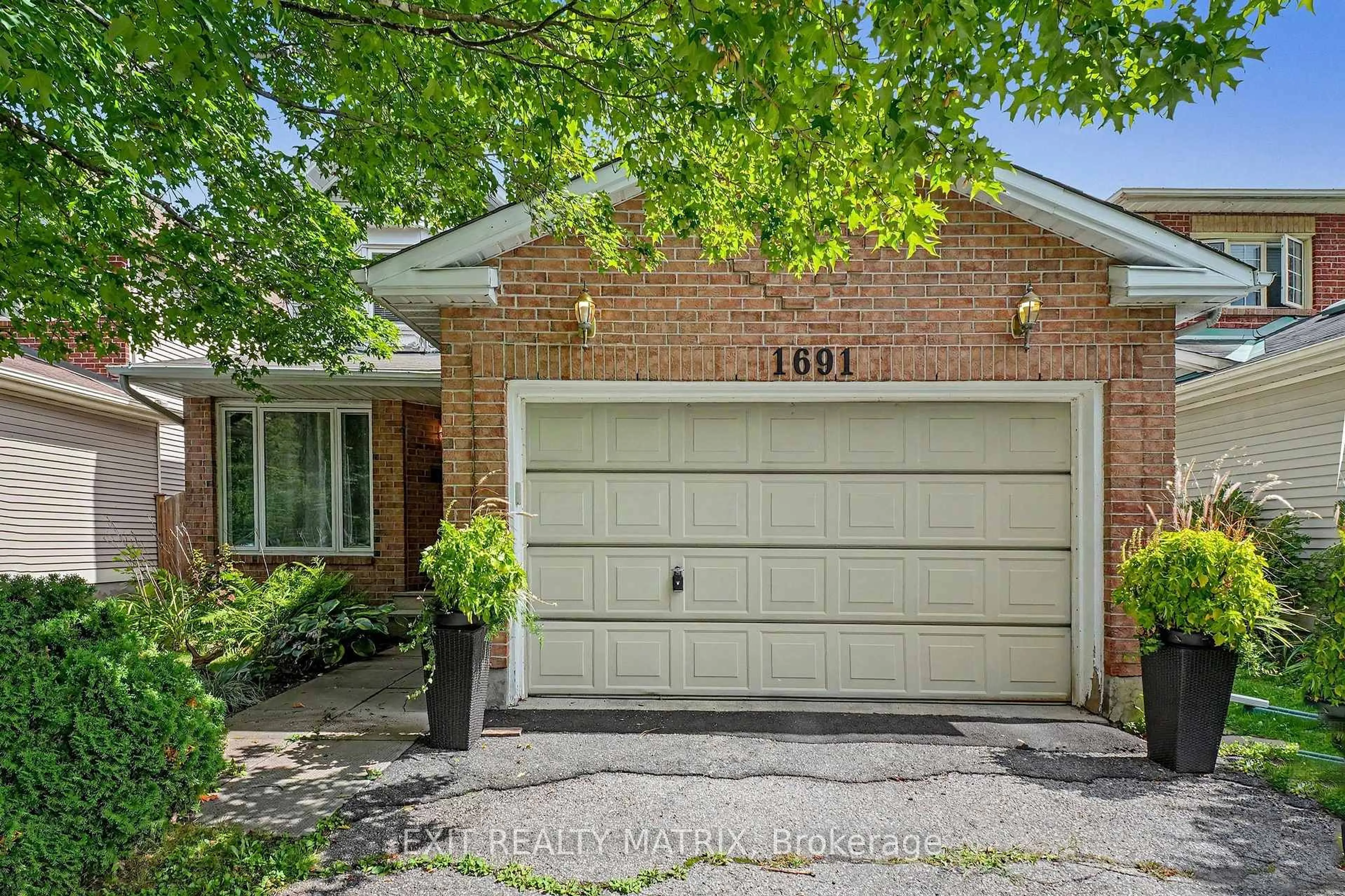 Home with brick exterior material, street for 1691 Hunters Run Dr, Ottawa Ontario K1C 6X3