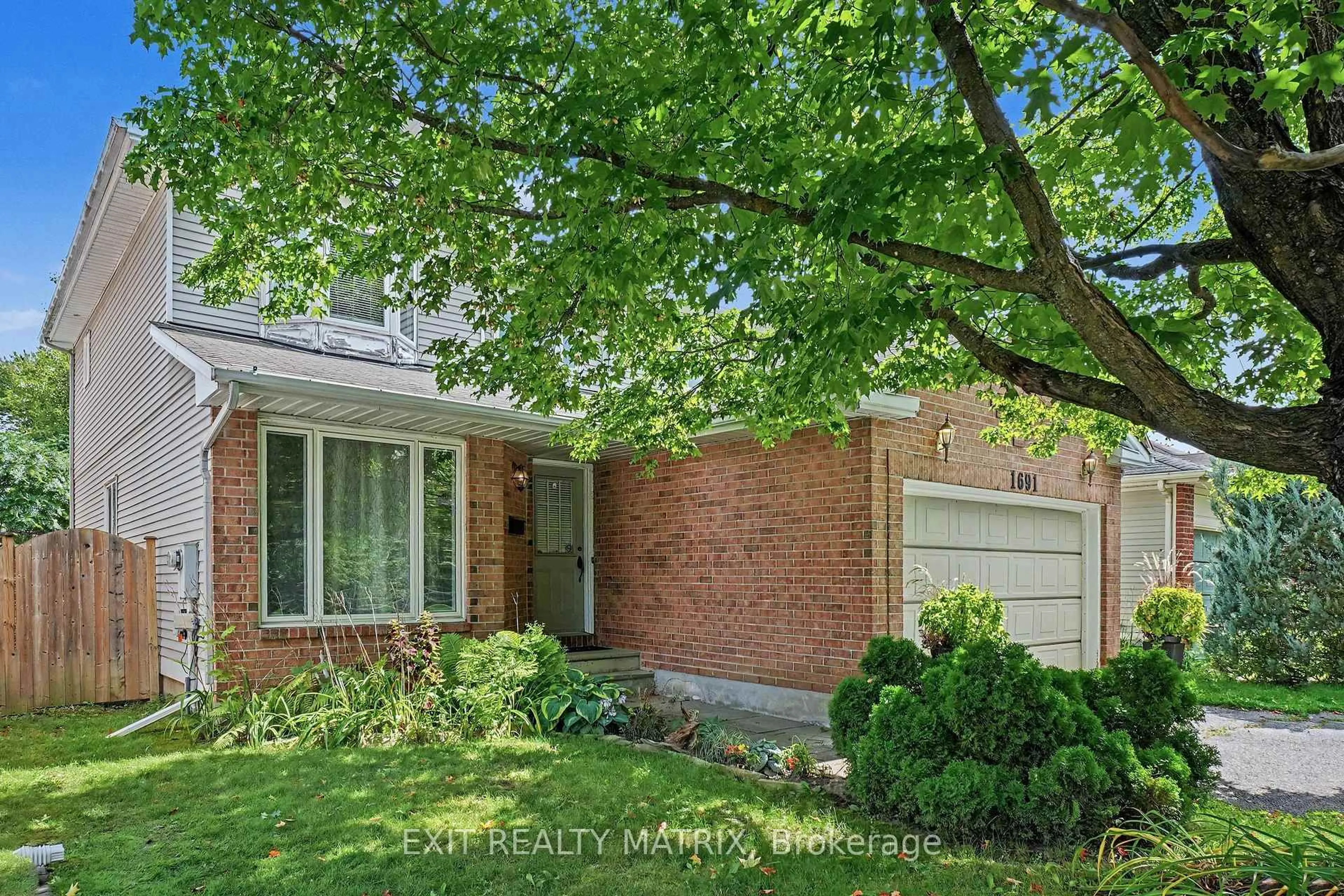 Home with brick exterior material, street for 1691 Hunters Run Dr, Ottawa Ontario K1C 6X3