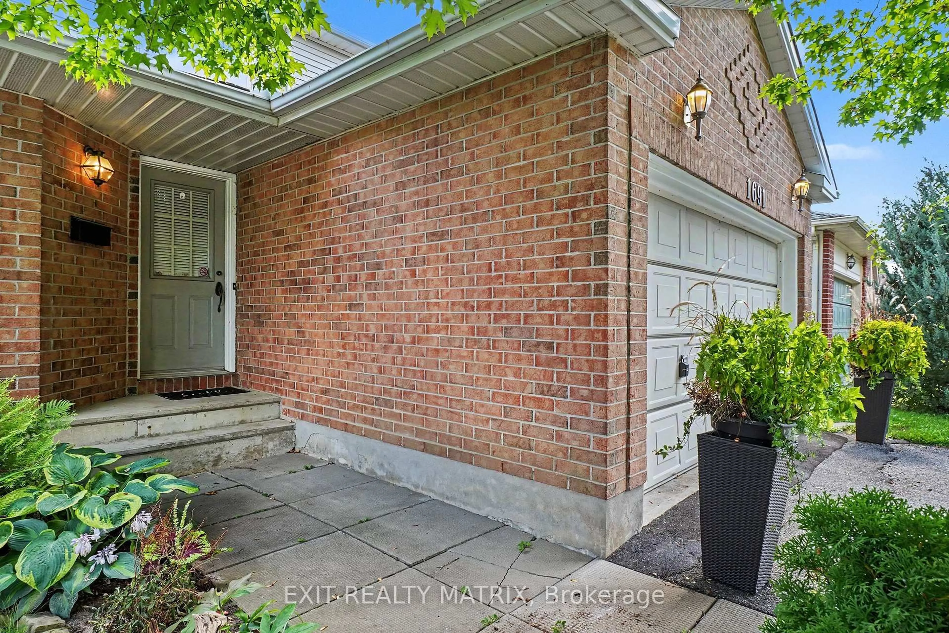 Home with brick exterior material, street for 1691 Hunters Run Dr, Ottawa Ontario K1C 6X3