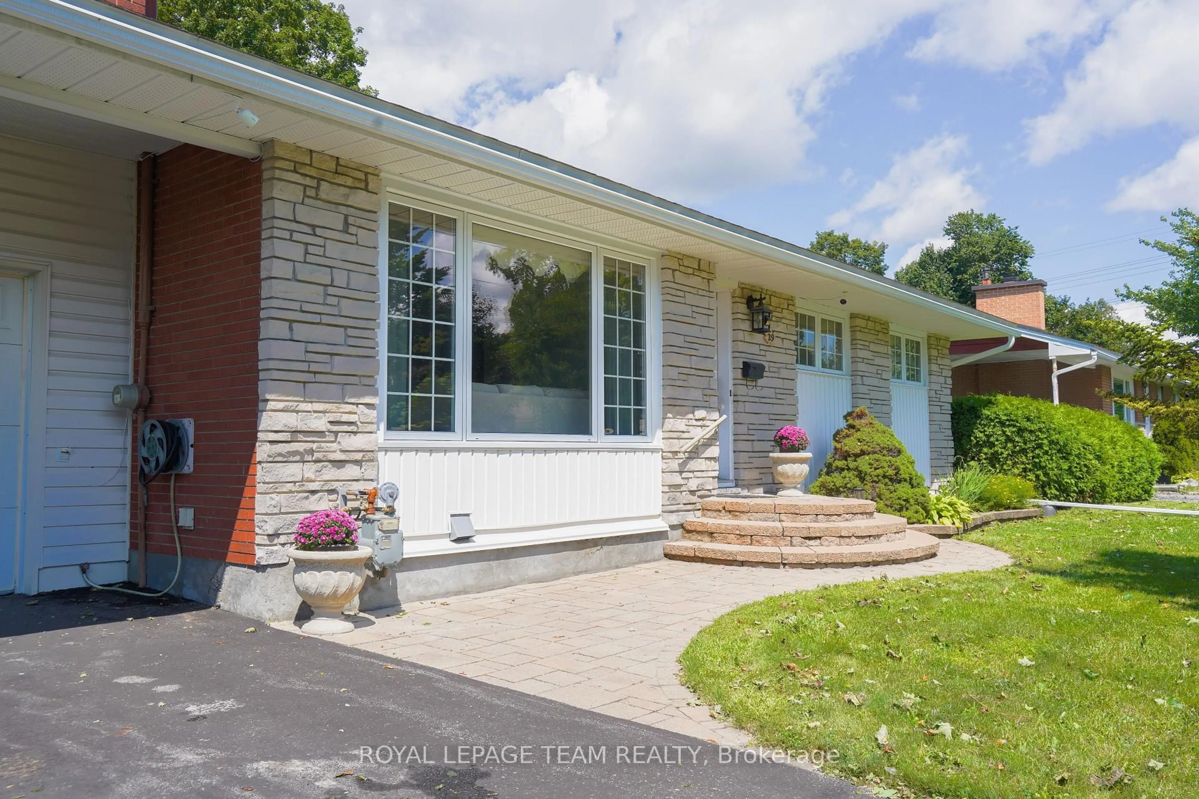 Home with brick exterior material, street for 29 Epworth Ave, Kanata Ontario K2G 2L6