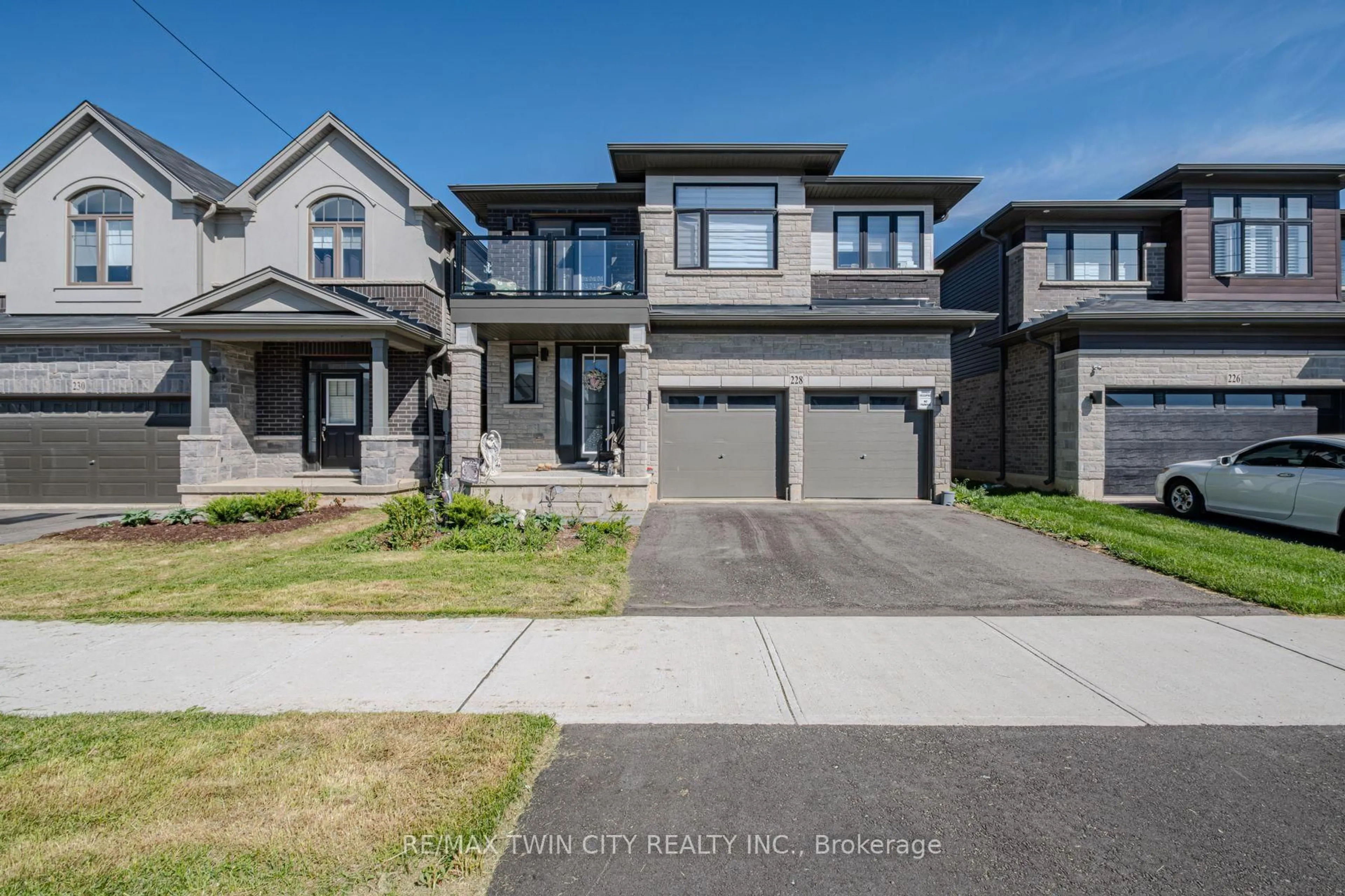 Home with brick exterior material, street for 228 Longboat Ru, Brantford Ontario N3T 0X1