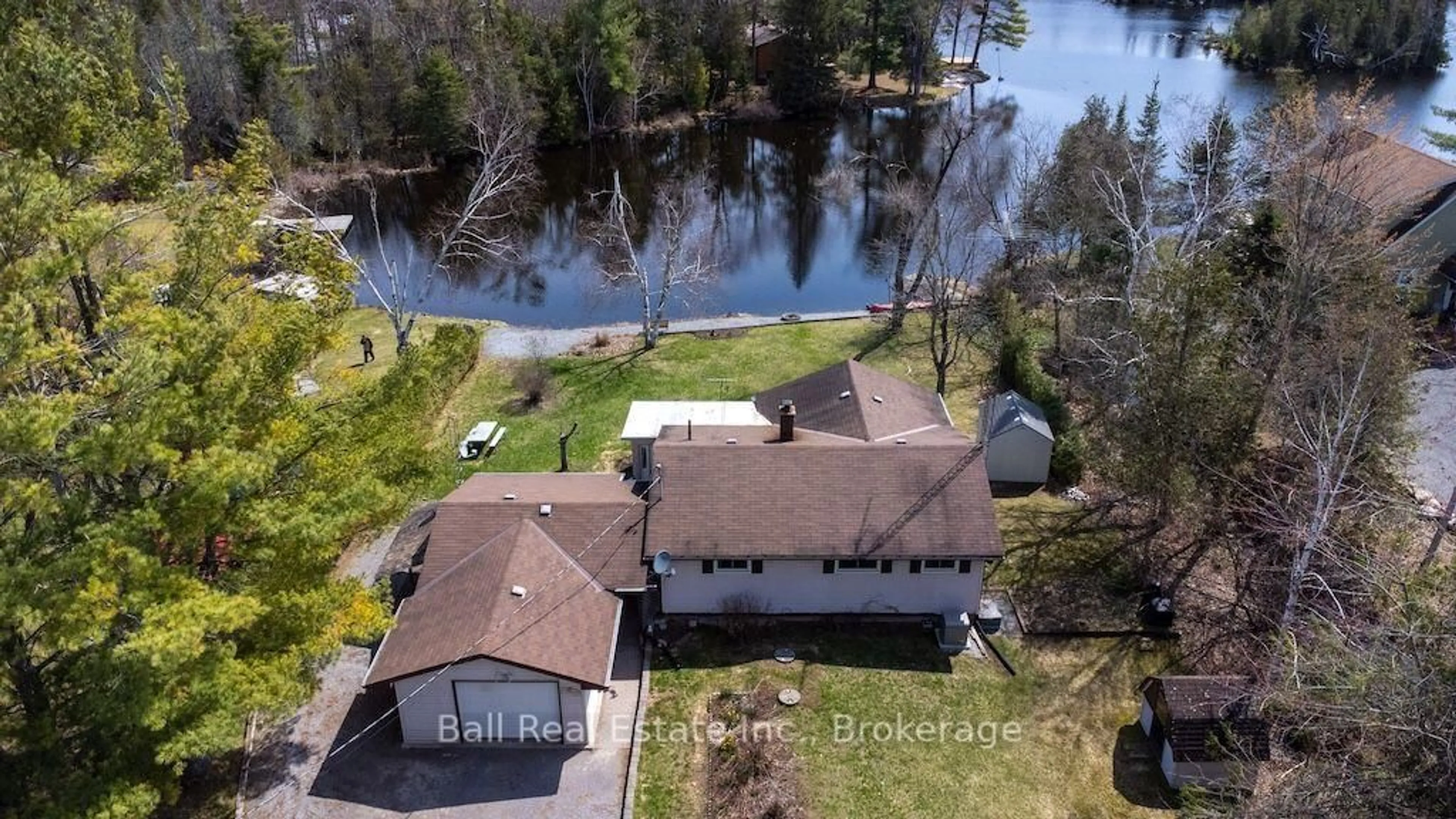 A pic from outside/outdoor area/front of a property/back of a property/a pic from drone, water/lake/river/ocean view for 2137 Chipmunk Rd, Douro-Dummer Ontario K0L 2H0