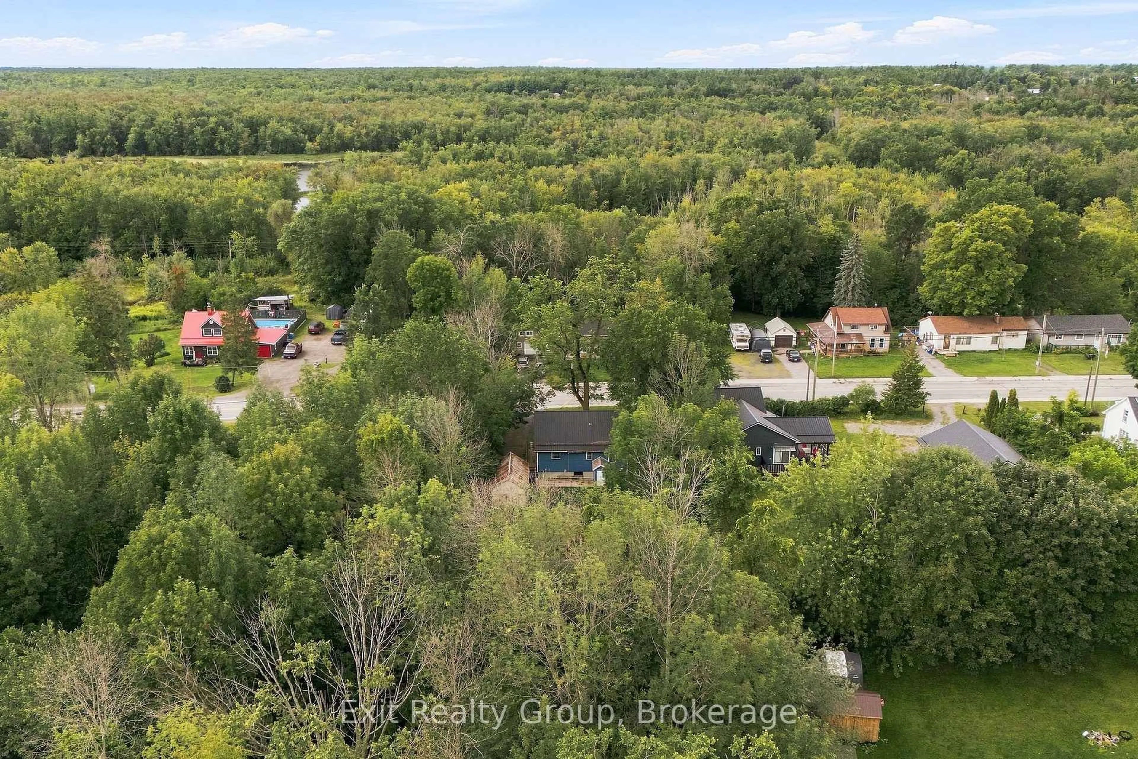 A pic from outside/outdoor area/front of a property/back of a property/a pic from drone, forest/trees view for 110 Forsyth St, Limoges Ontario K0K 2M0