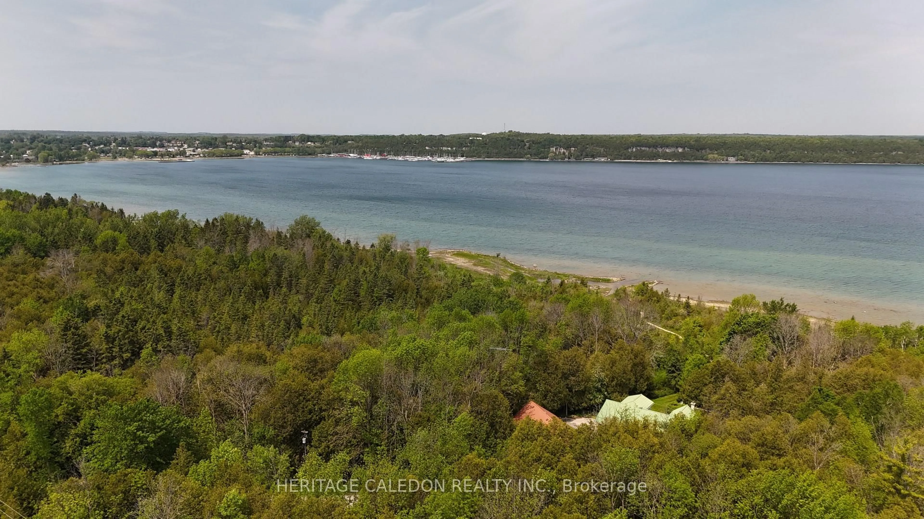 A pic from outside/outdoor area/front of a property/back of a property/a pic from drone, water/lake/river/ocean view for 501241 Grey Rd 1, Georgian Bluffs Ontario N0H 2T0