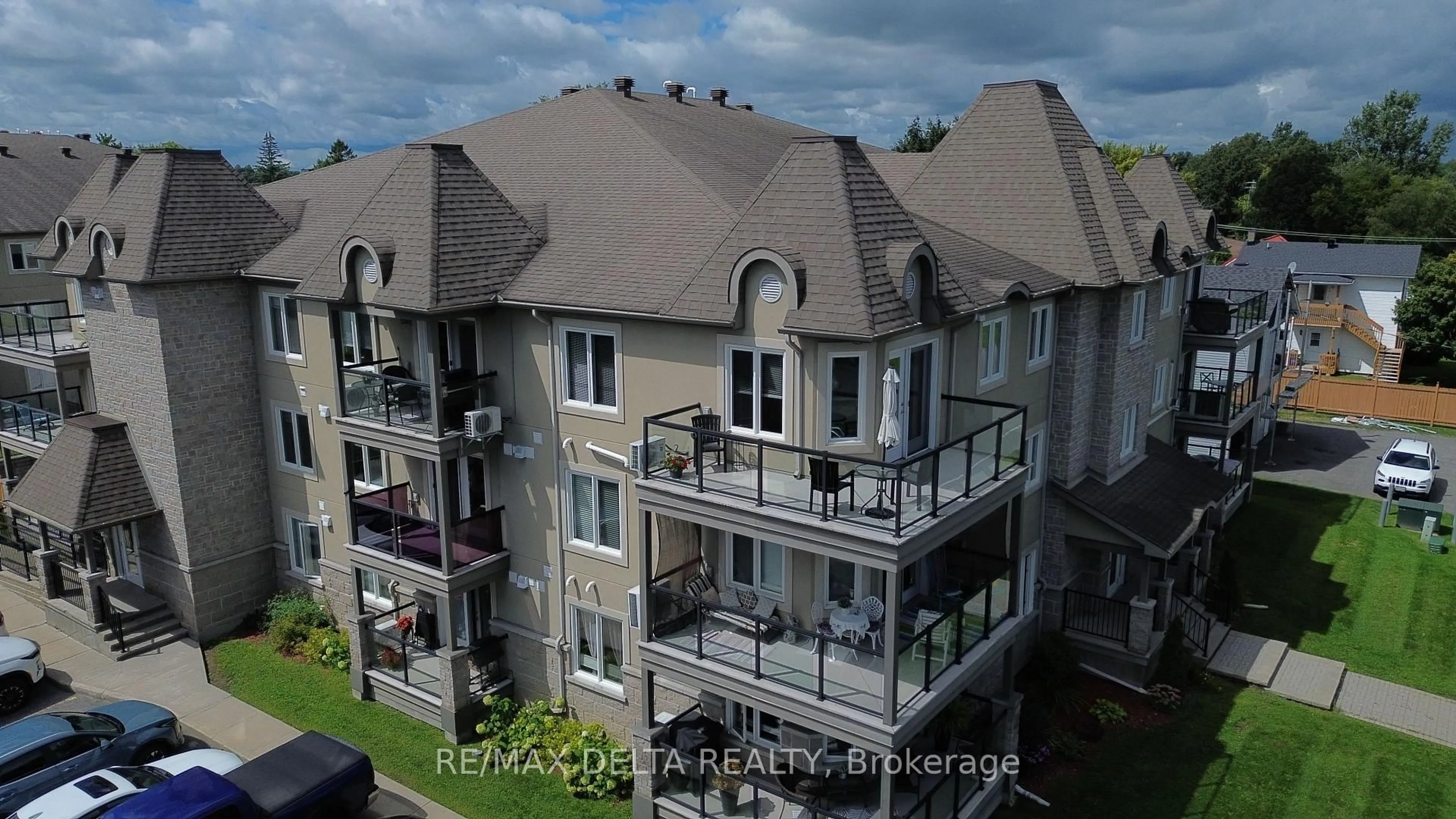A pic from outside/outdoor area/front of a property/back of a property/a pic from drone, city buildings view from balcony for 755 Brébeuf St #301, Casselman Ontario K0A 1M0