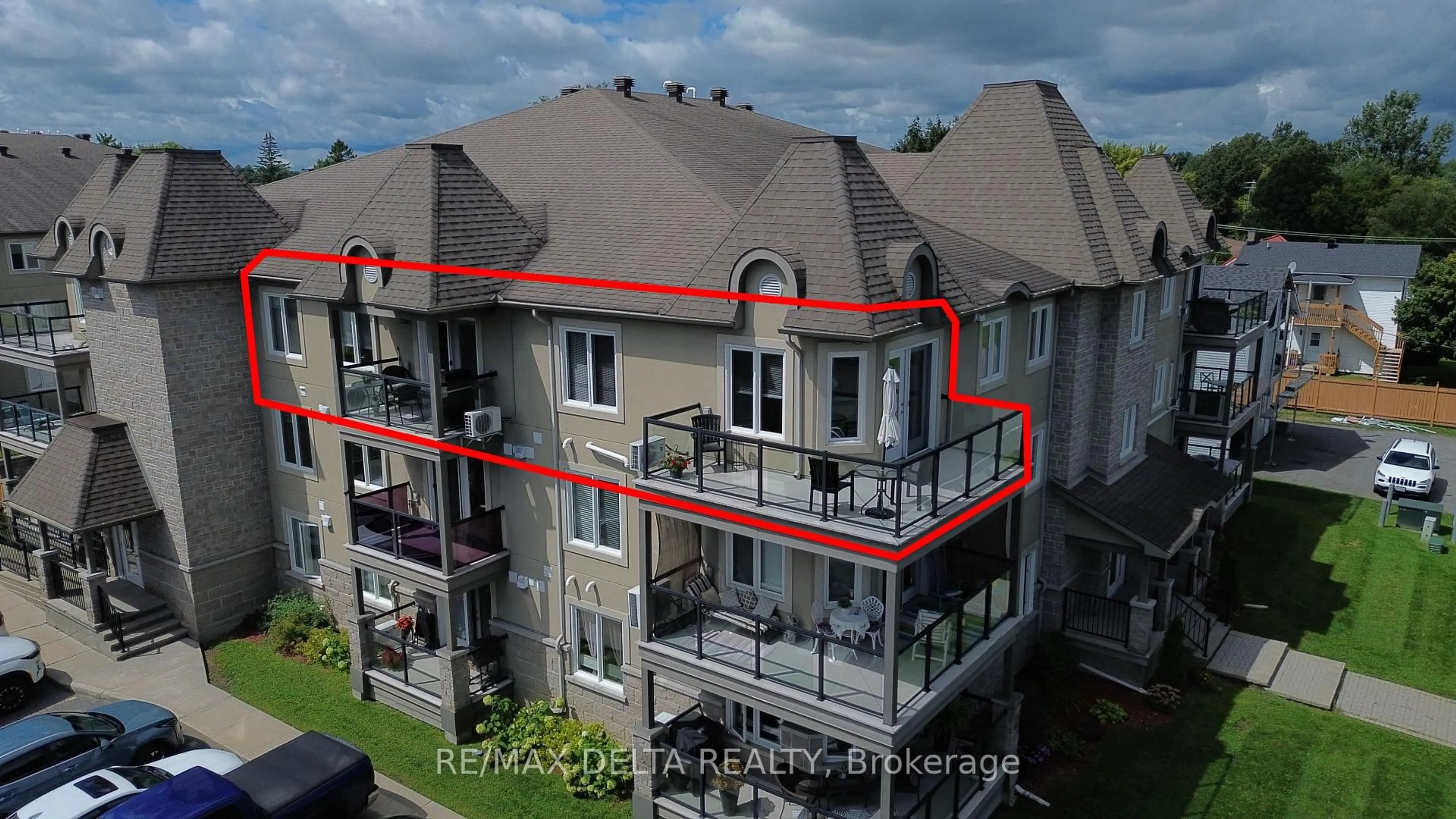 A pic from outside/outdoor area/front of a property/back of a property/a pic from drone, city buildings view from balcony for 755 Brébeuf St #301, Casselman Ontario K0A 1M0
